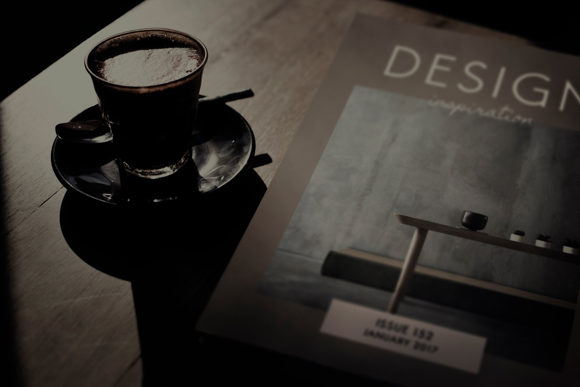 an abstract photo of a curved building with a blue sky in the background