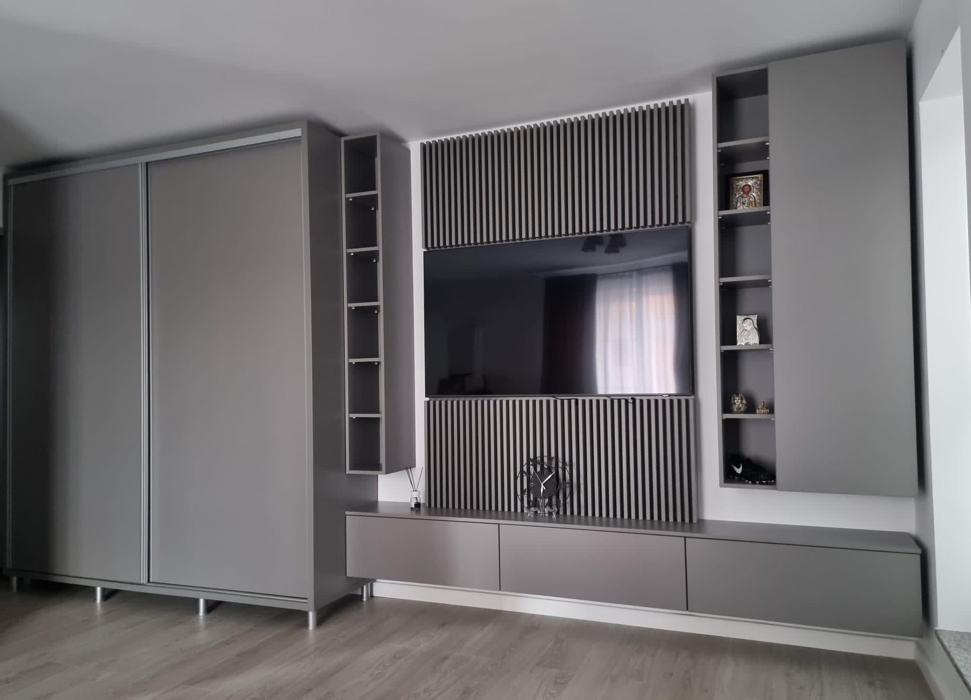 an abstract photo of a curved building with a blue sky in the background