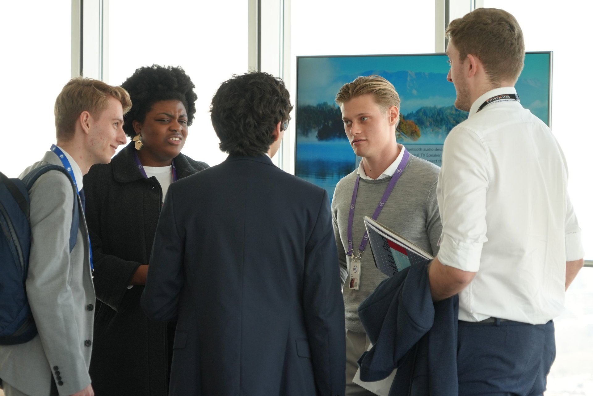 an abstract photo of a curved building with a blue sky in the background