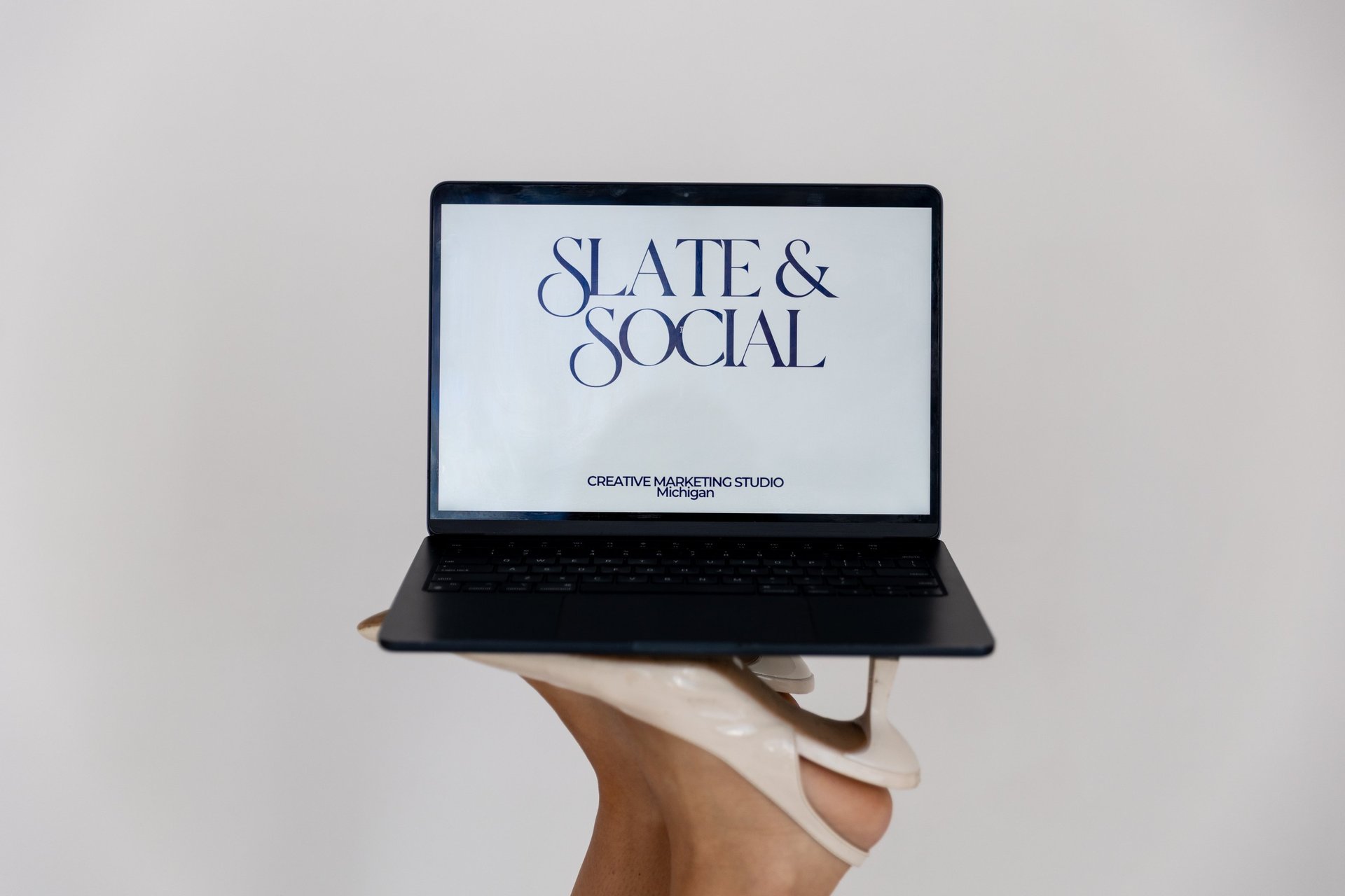 black and brown leather padded tub sofa