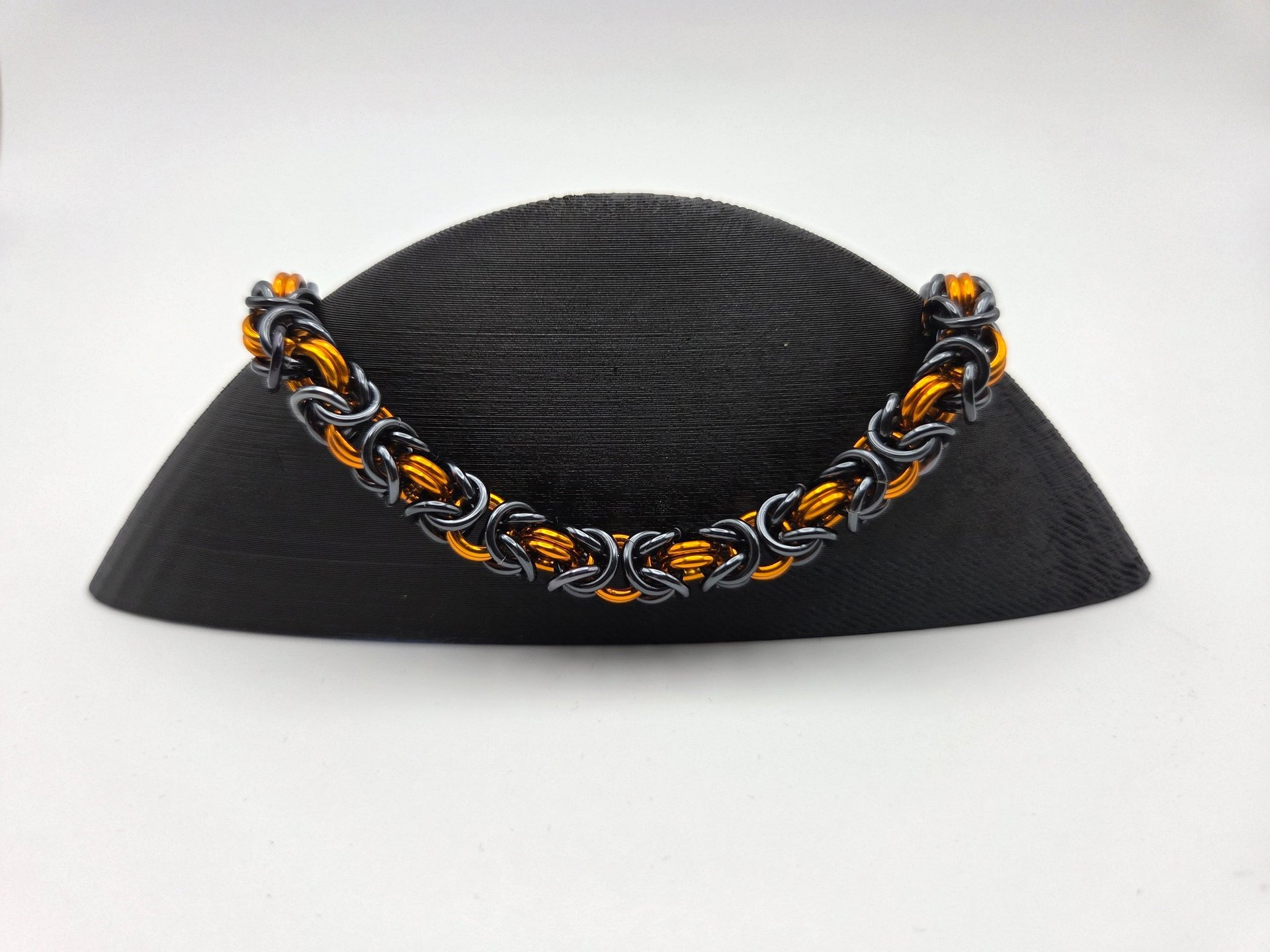 person wearing grey knit sweater