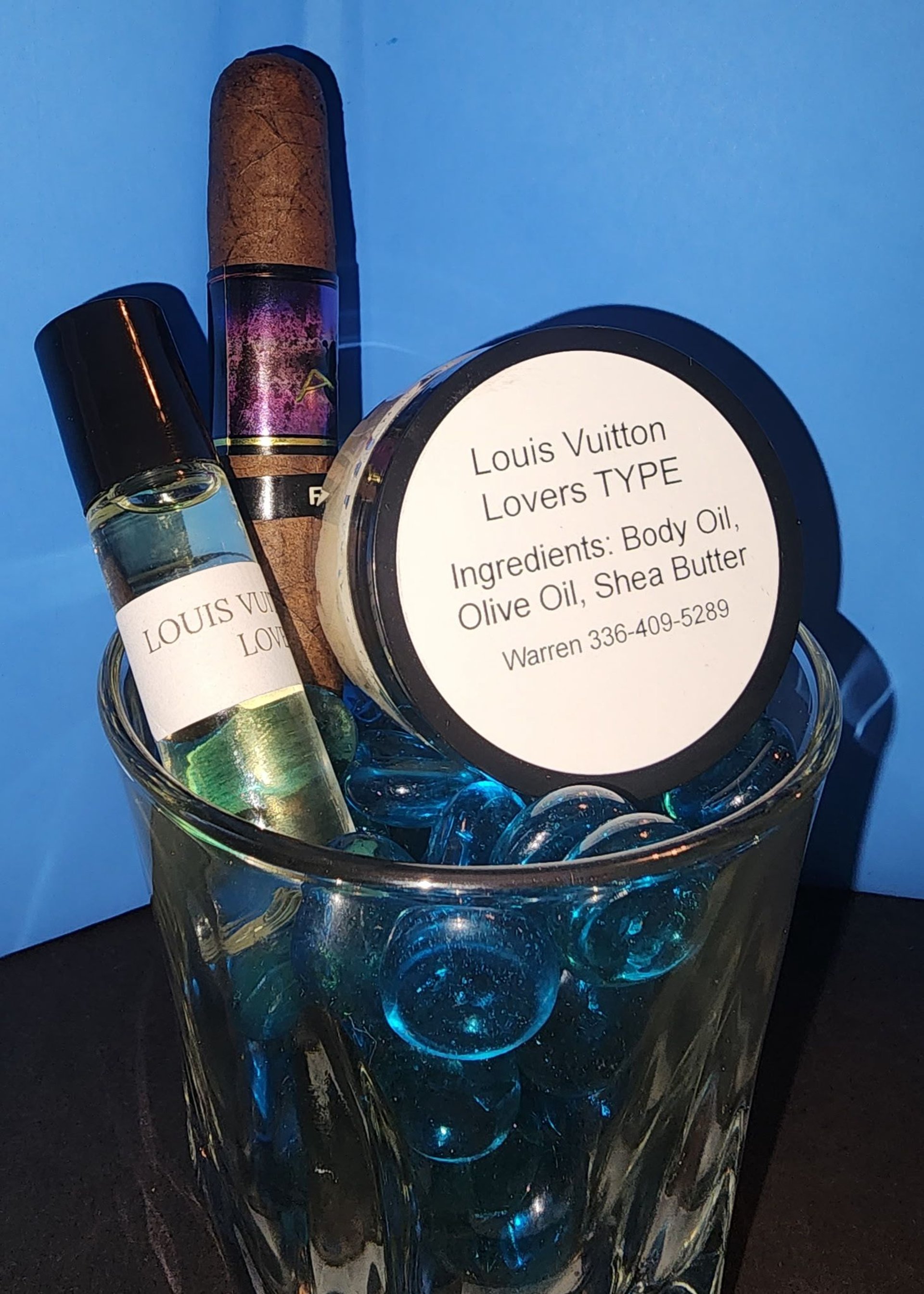 a small white container on a green leaf