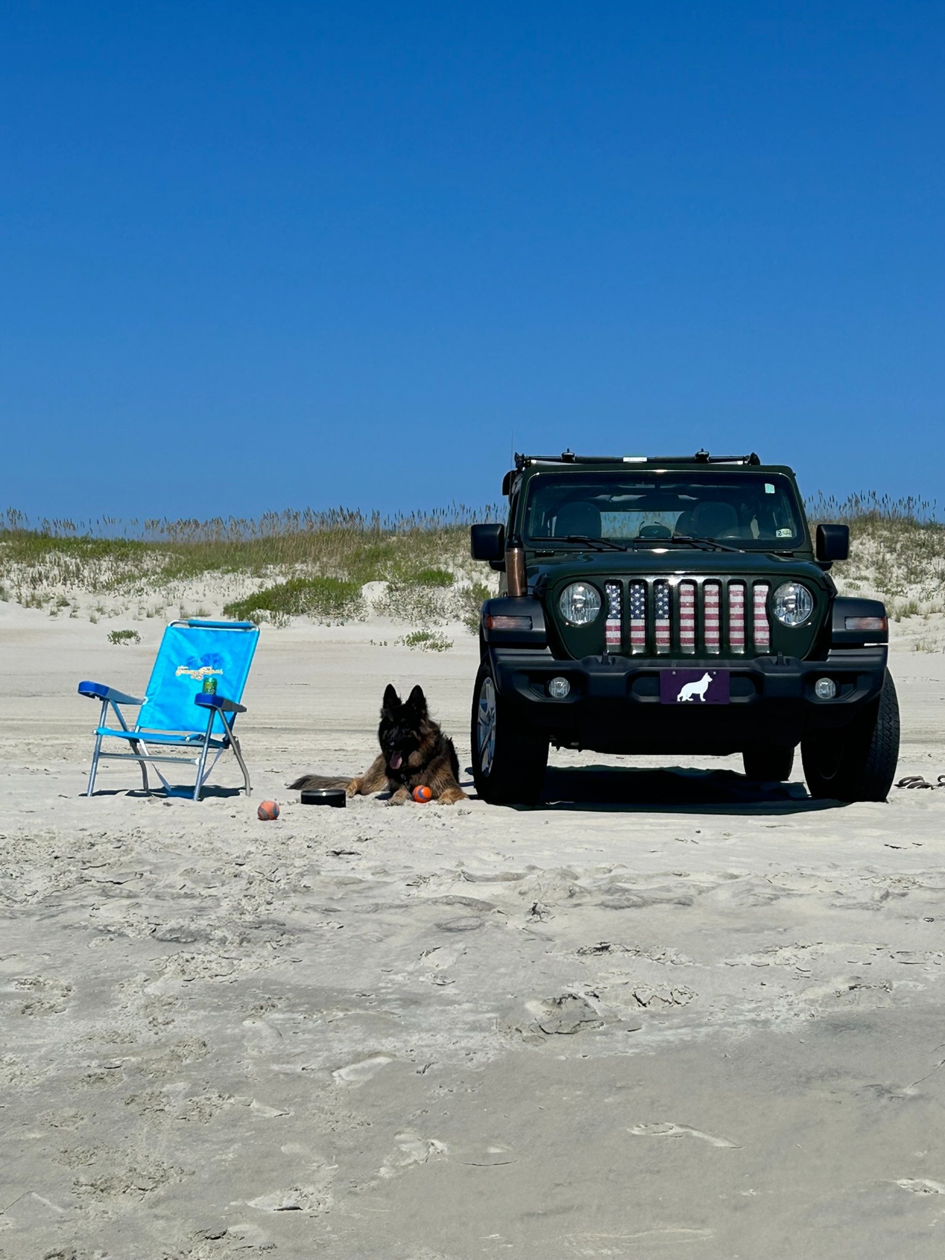 woman wearing yellow long-sleeved dress under white clouds and blue sky during daytime