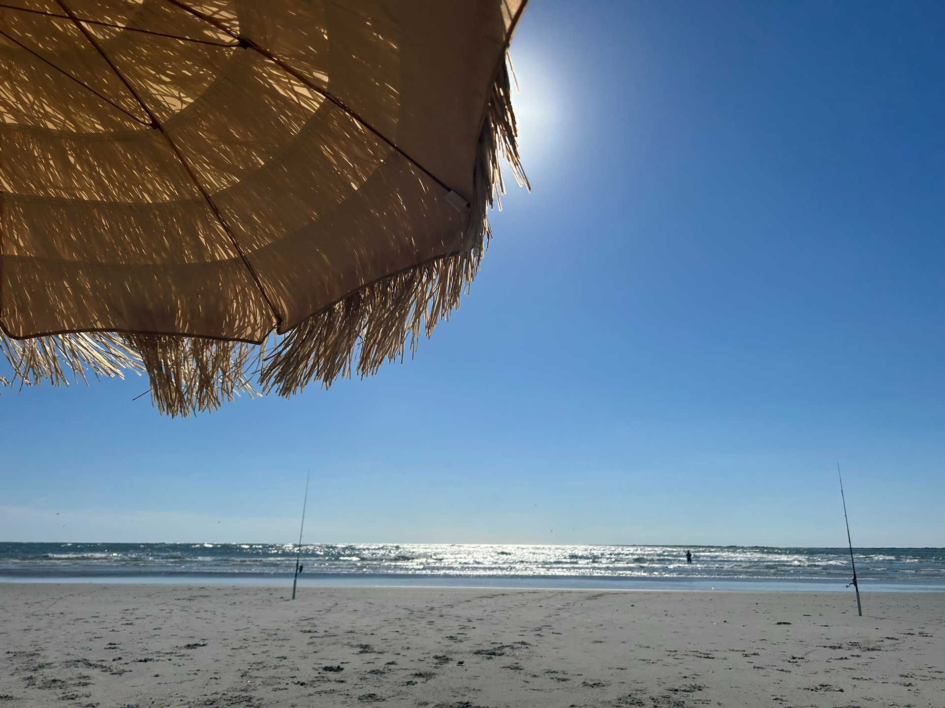 woman wearing yellow long-sleeved dress under white clouds and blue sky during daytime