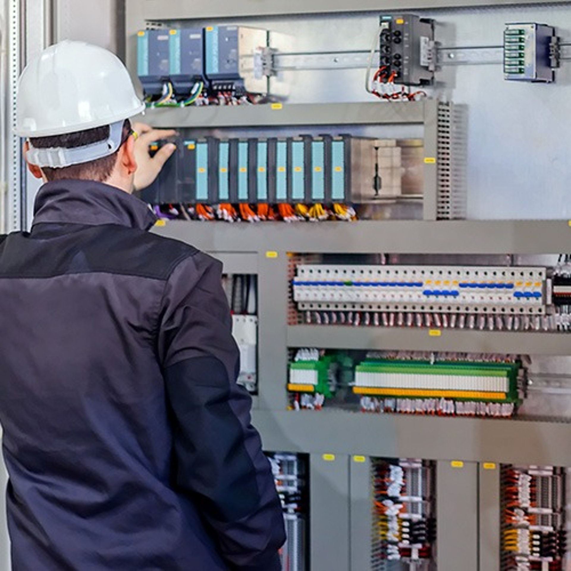 man in black jacket smoking cigarette