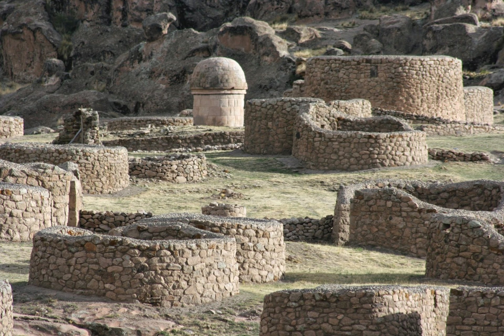 an abstract photo of a curved building with a blue sky in the background
