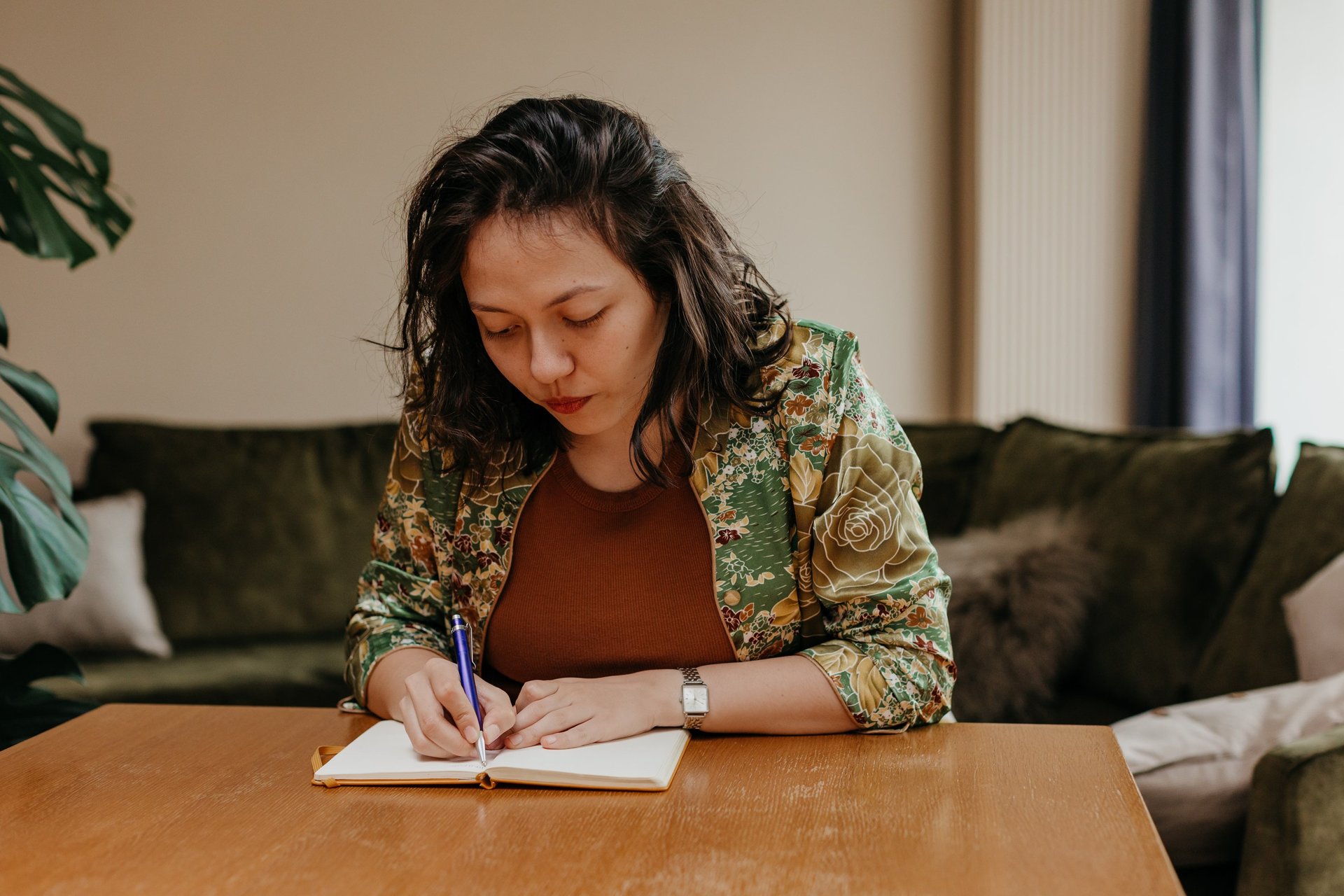 an abstract photo of a curved building with a blue sky in the background