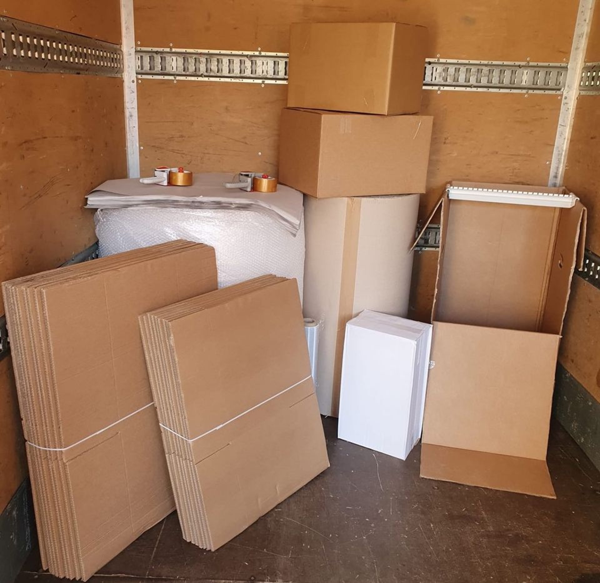 black and brown leather padded tub sofa