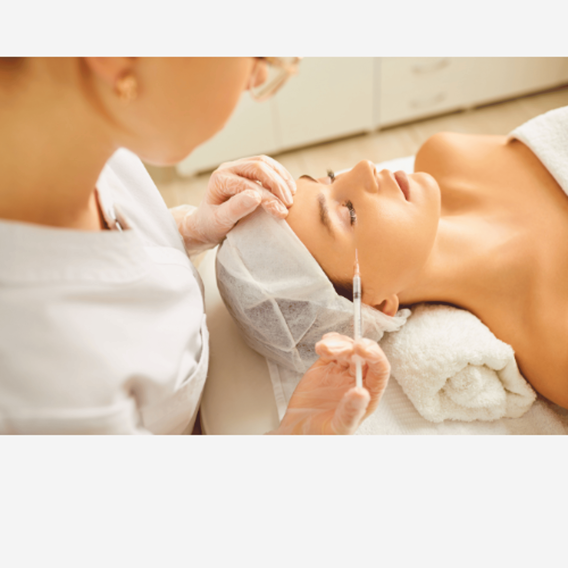 A woman getting her teeth checked by a dentist