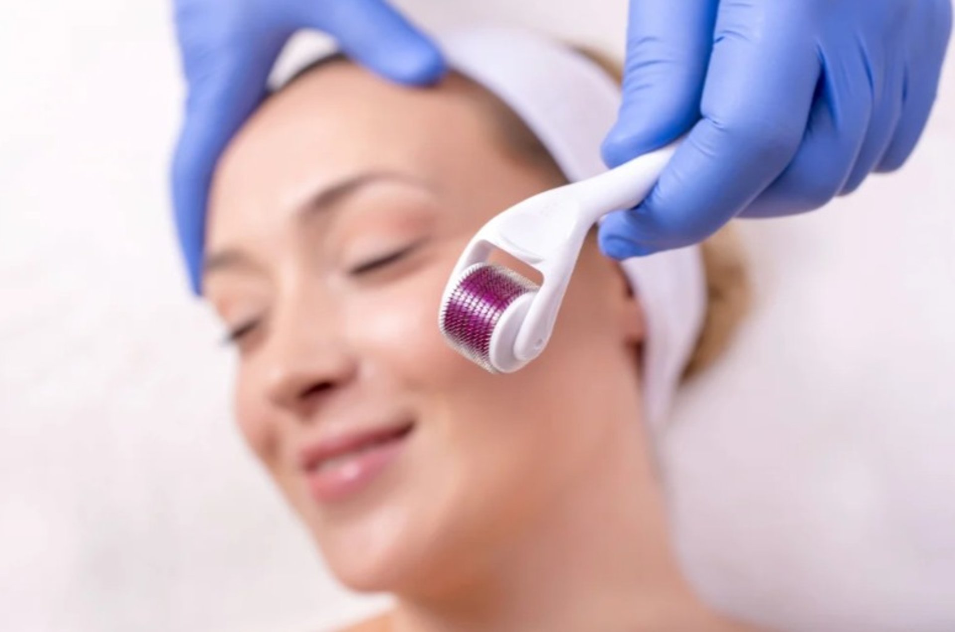 A woman getting her teeth checked by a dentist
