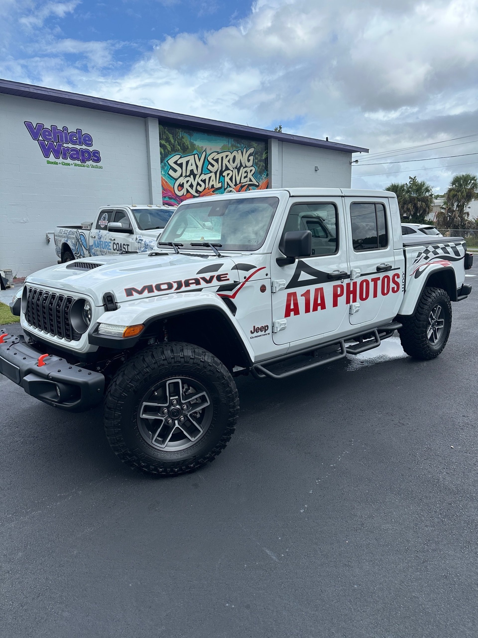 black and brown leather padded tub sofa