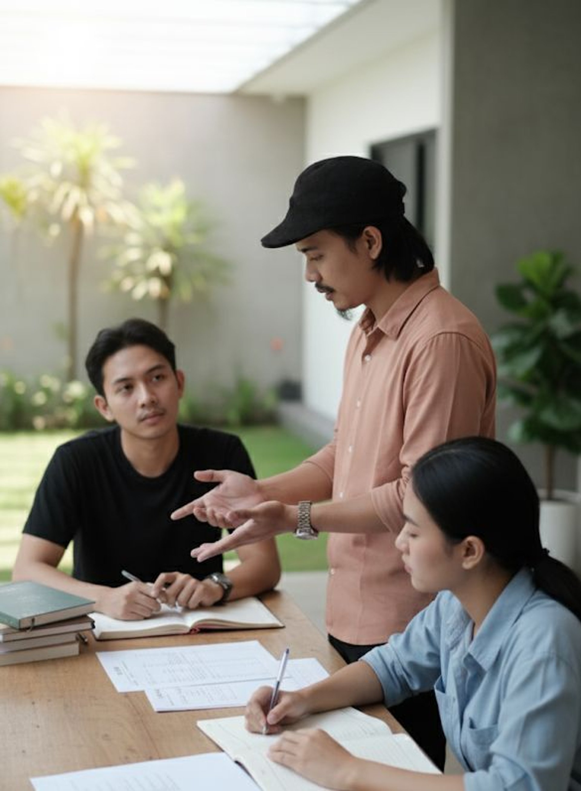 an abstract photo of a curved building with a blue sky in the background