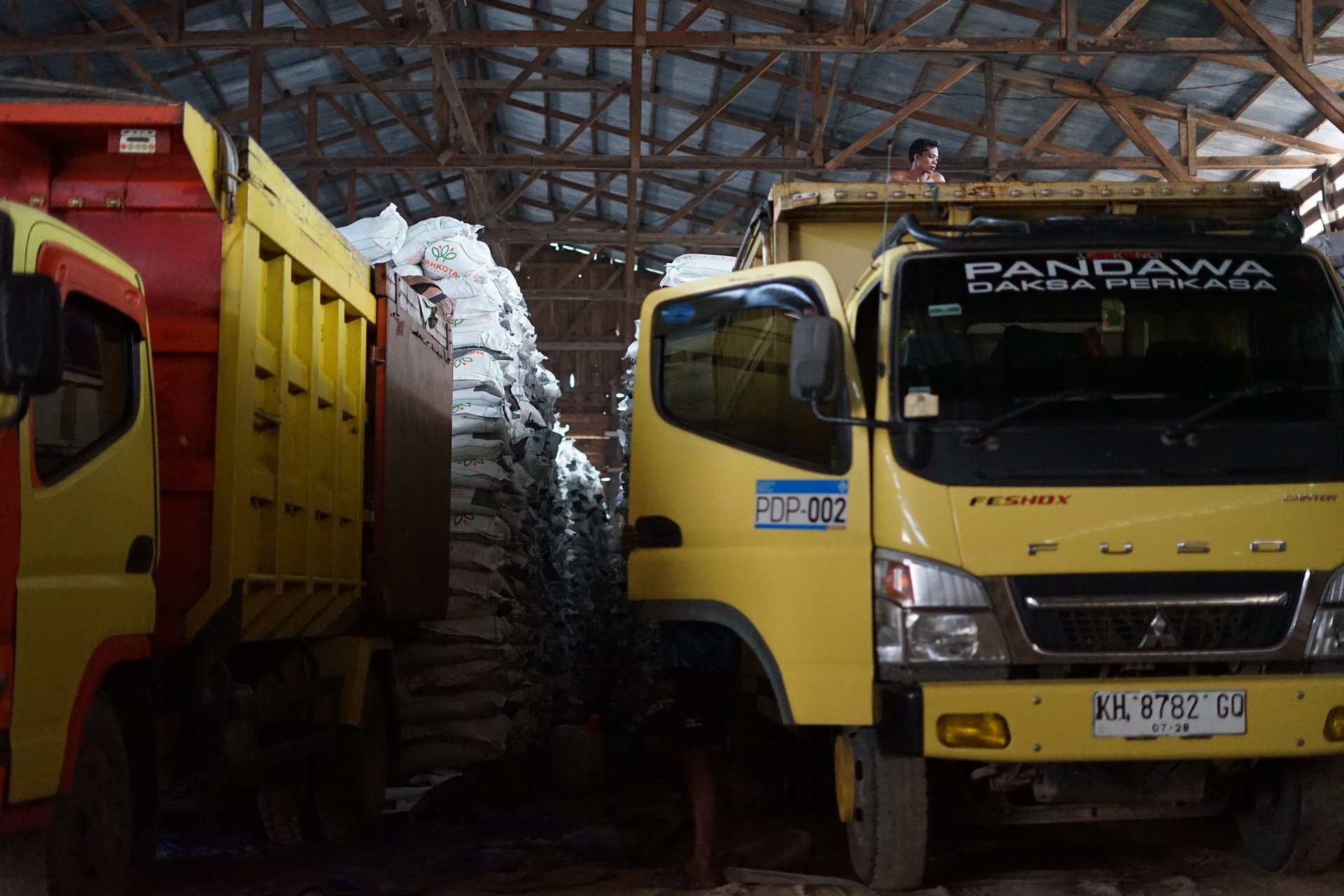 an abstract photo of a curved building with a blue sky in the background
