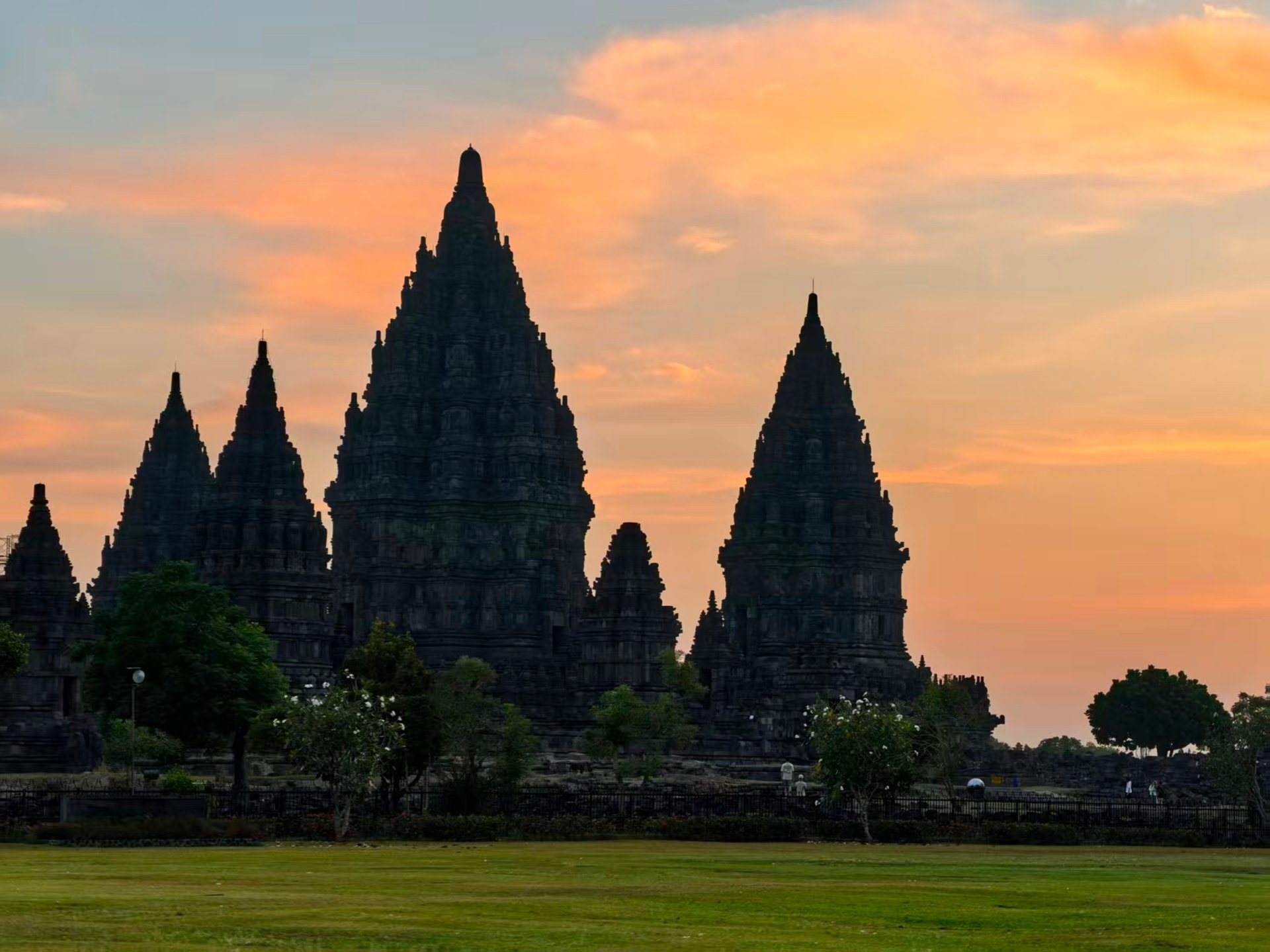 The sun shines brightly through the windows of a building