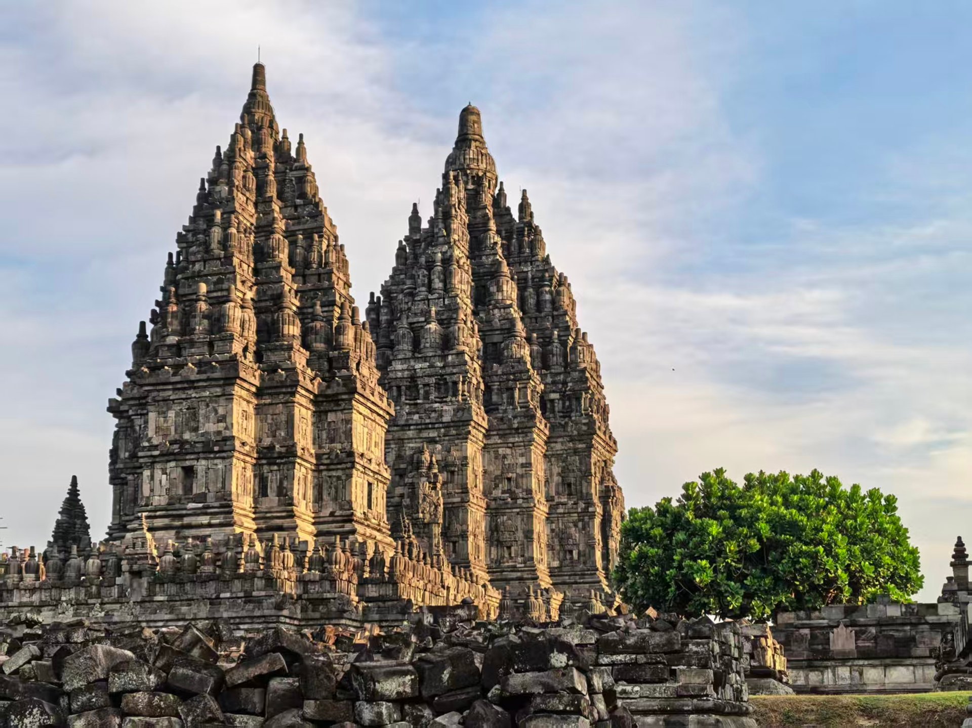 The sun shines brightly through the windows of a building