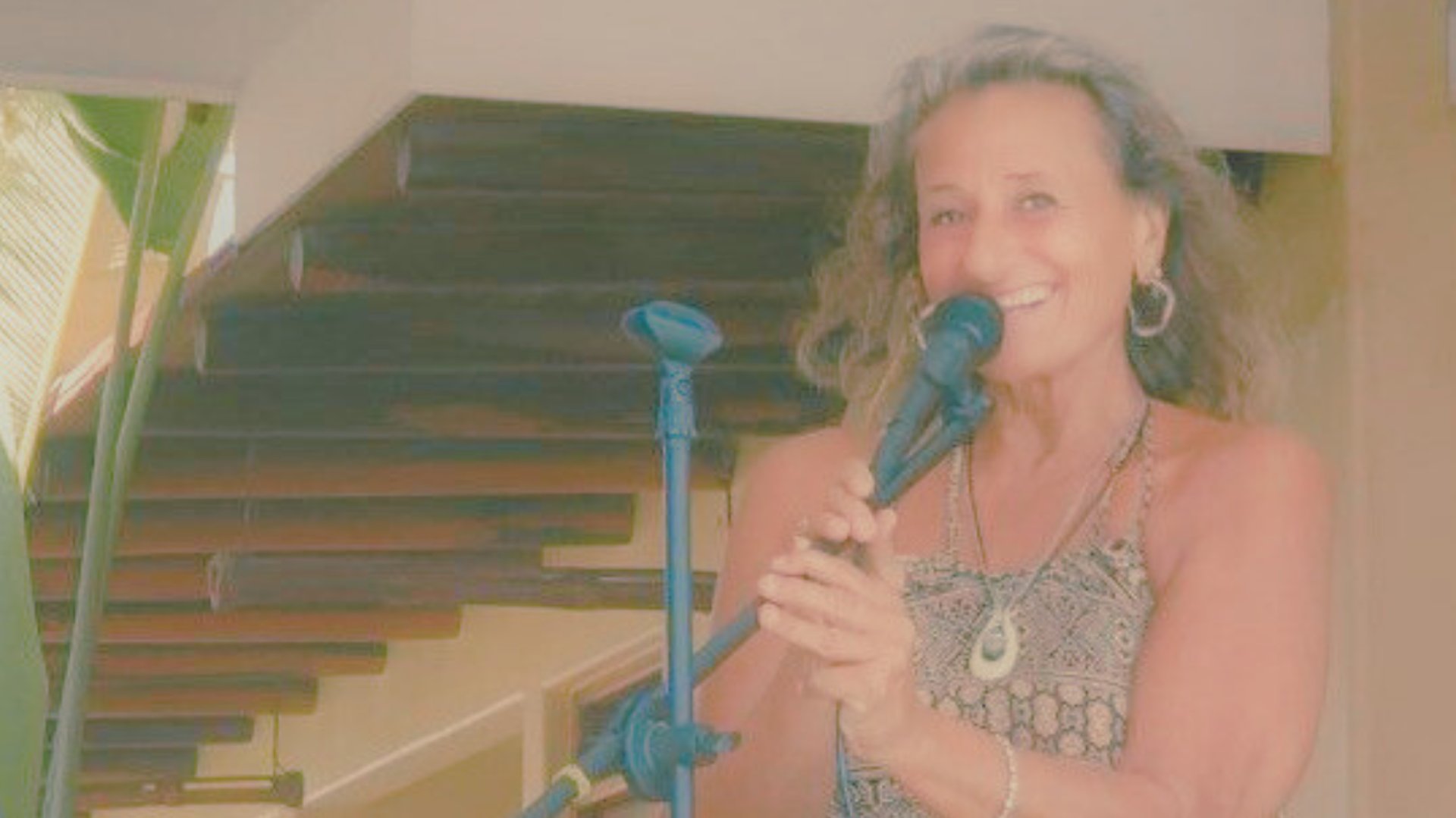 woman holding dried flower