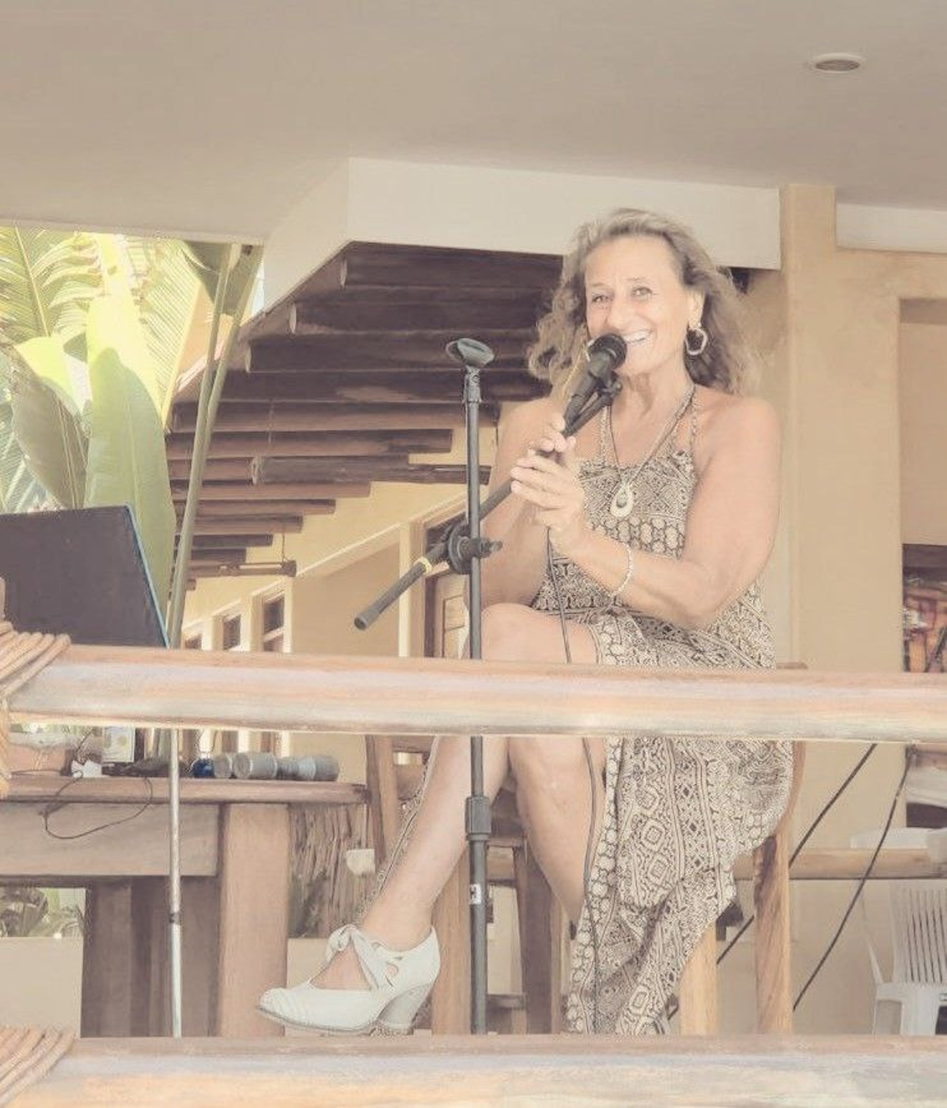 woman holding dried flower