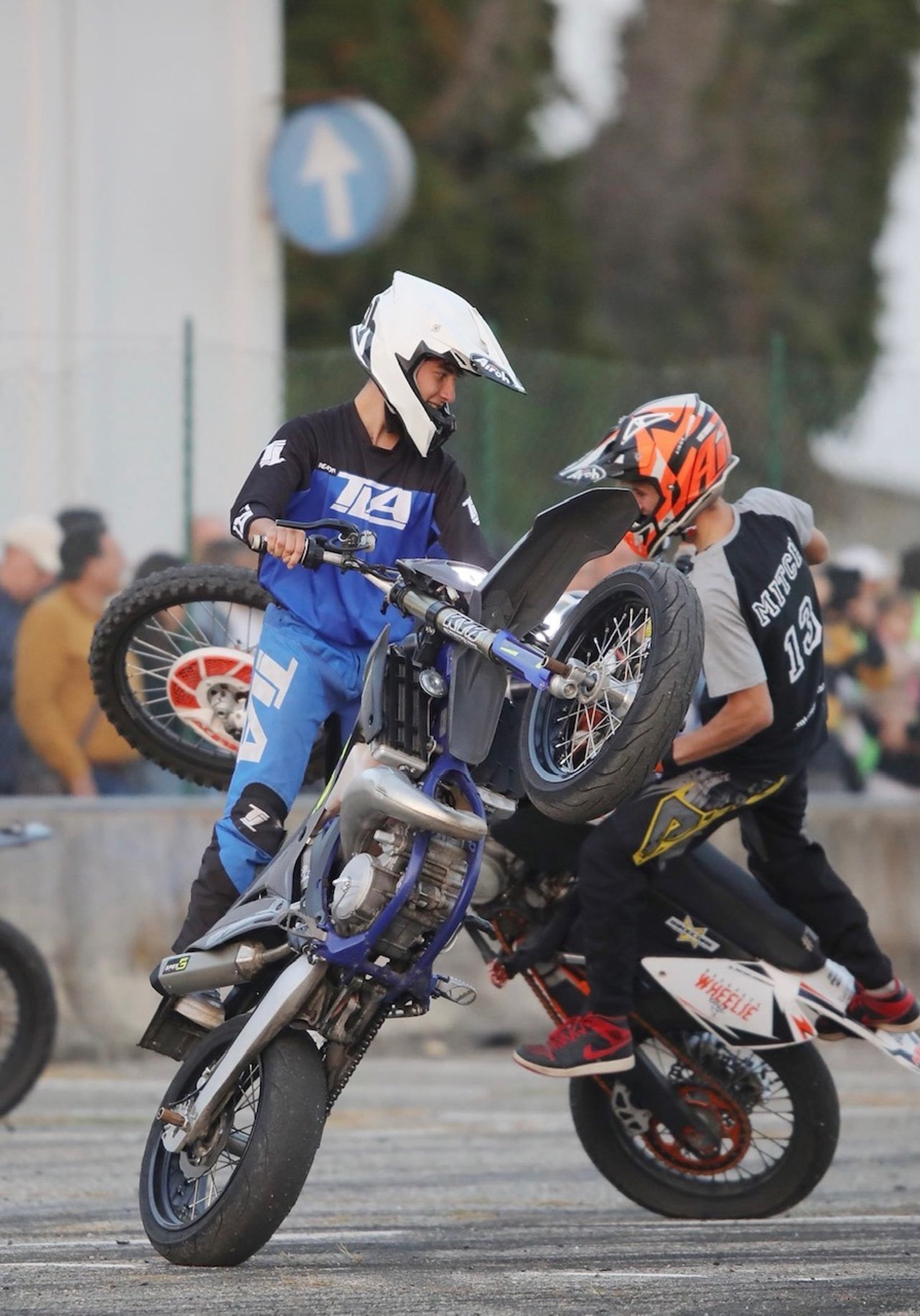 an abstract photo of a curved building with a blue sky in the background