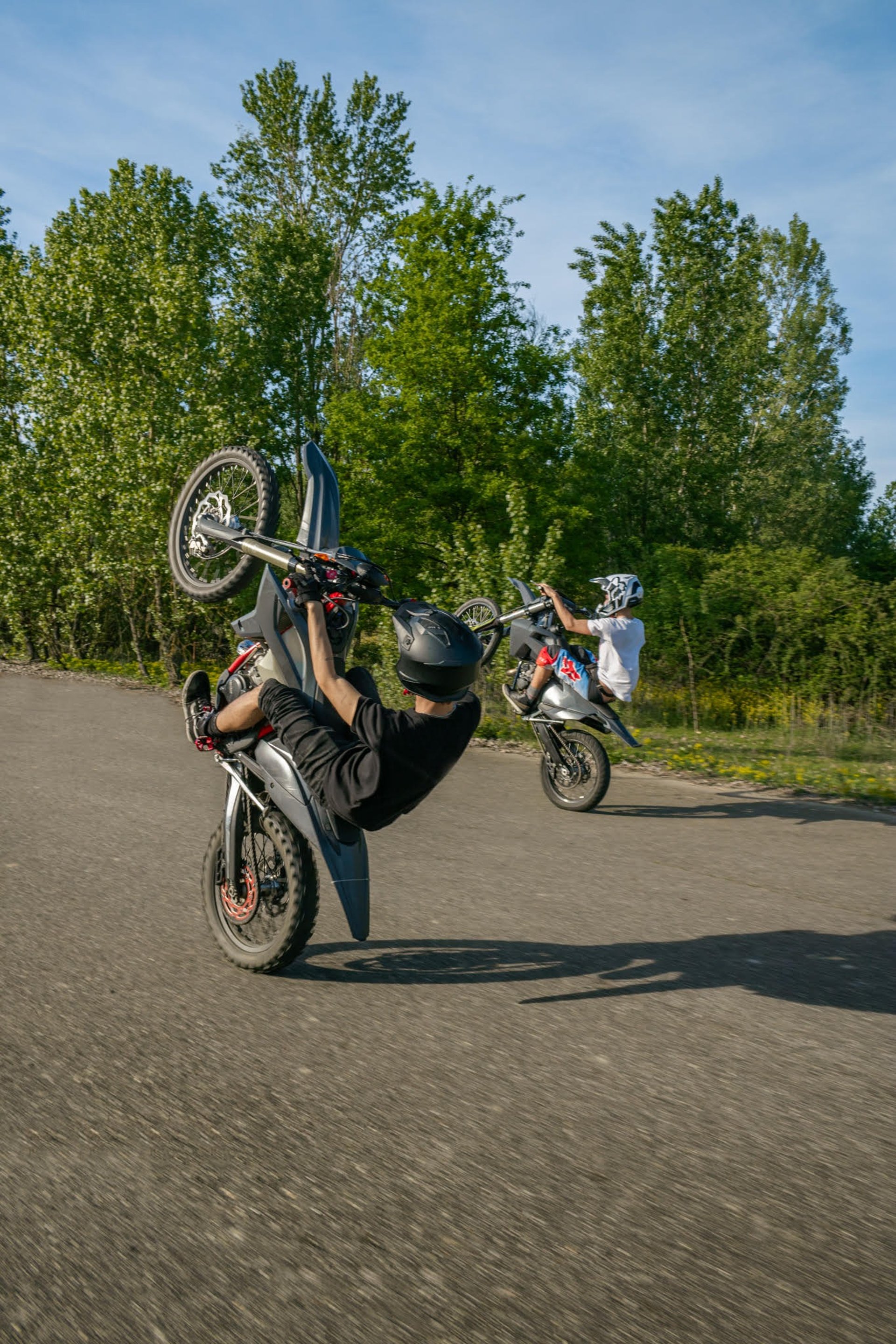 woman wearing yellow long-sleeved dress under white clouds and blue sky during daytime