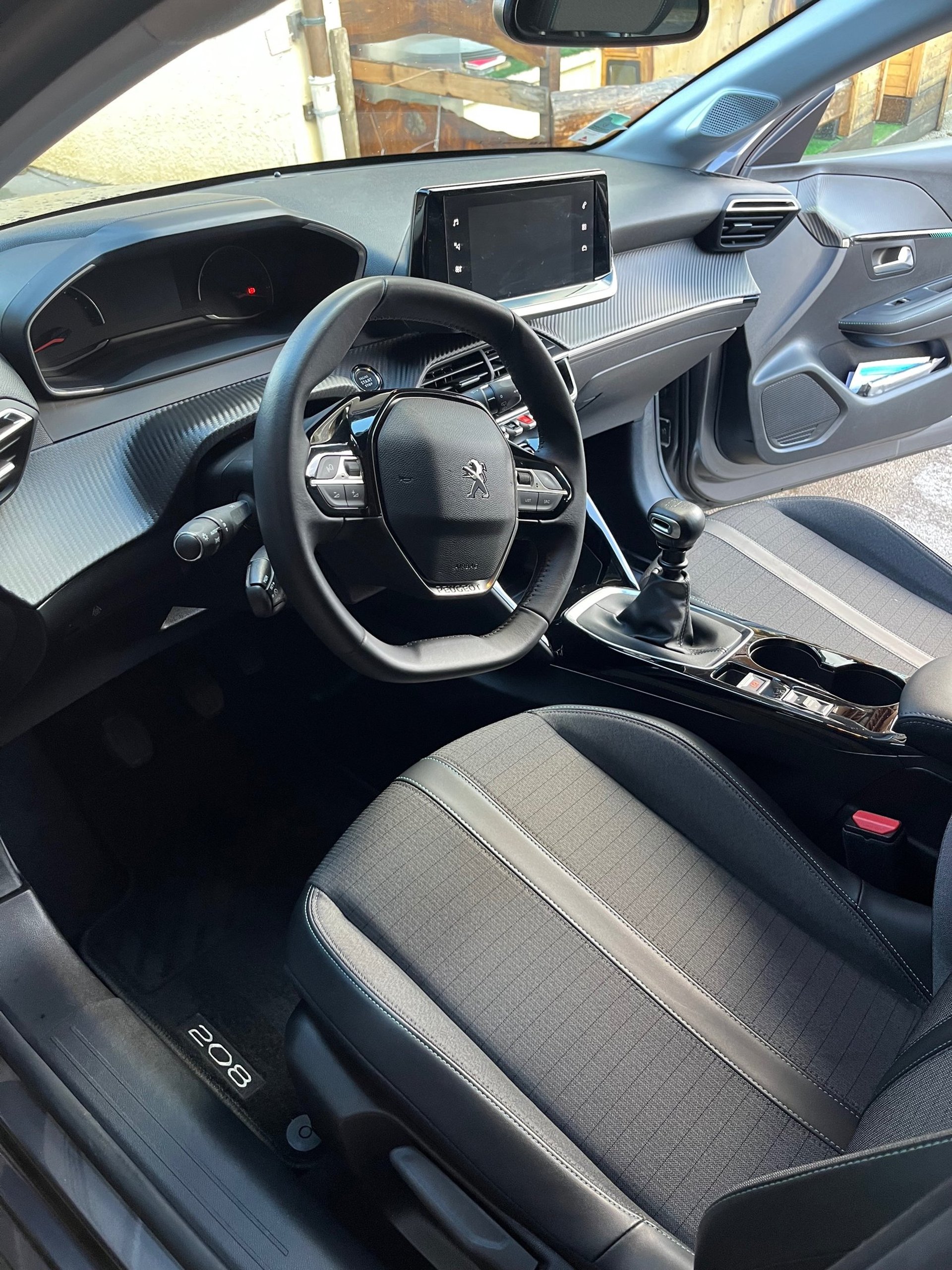 the dashboard of a car with a gps device