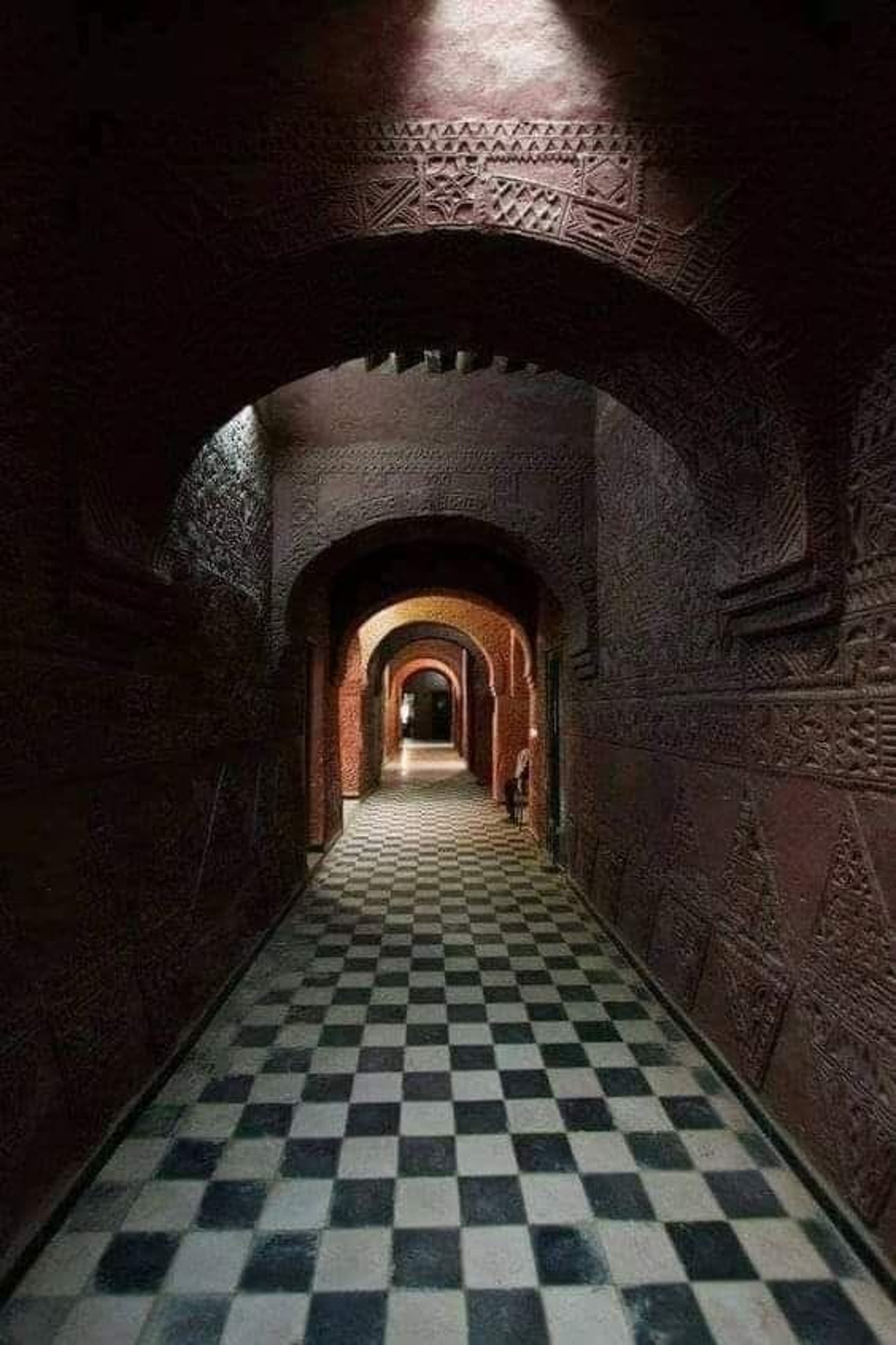 black and brown leather padded tub sofa