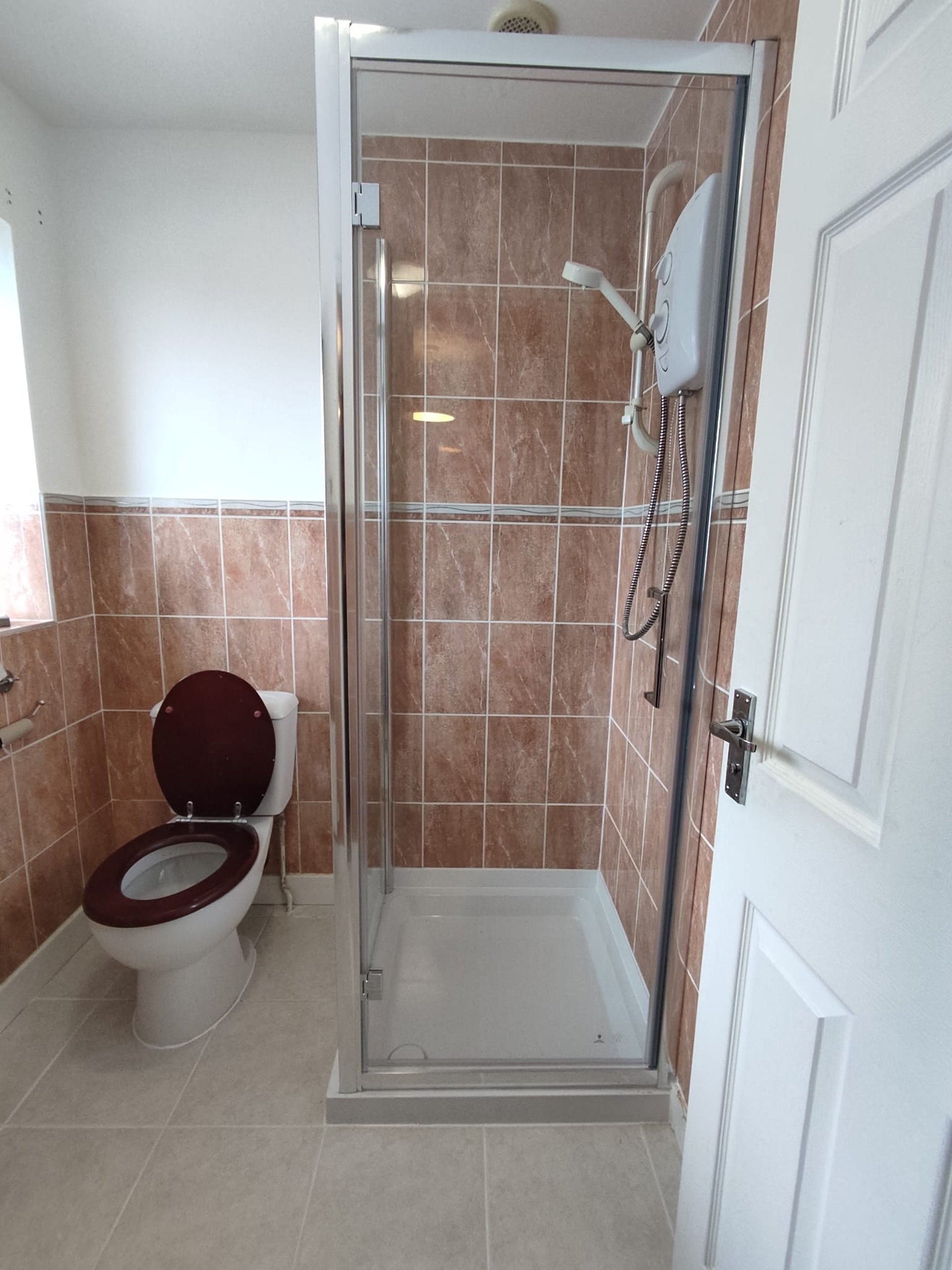 closeup photo of yellow and black handheld tool near white plastic locks