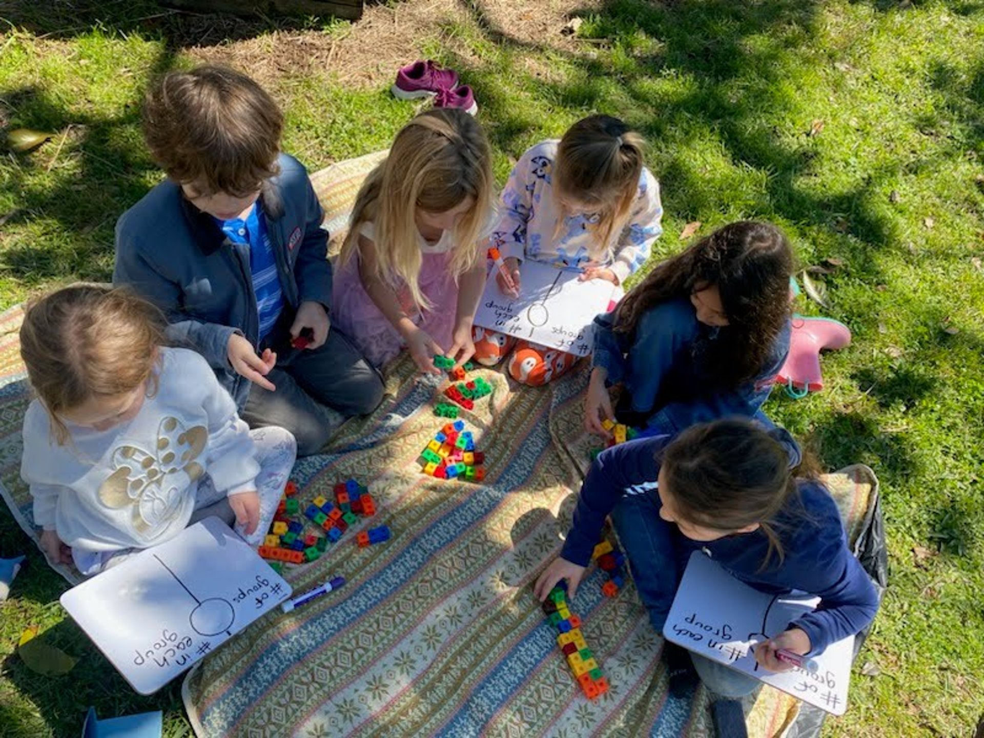 woman wearing yellow long-sleeved dress under white clouds and blue sky during daytime