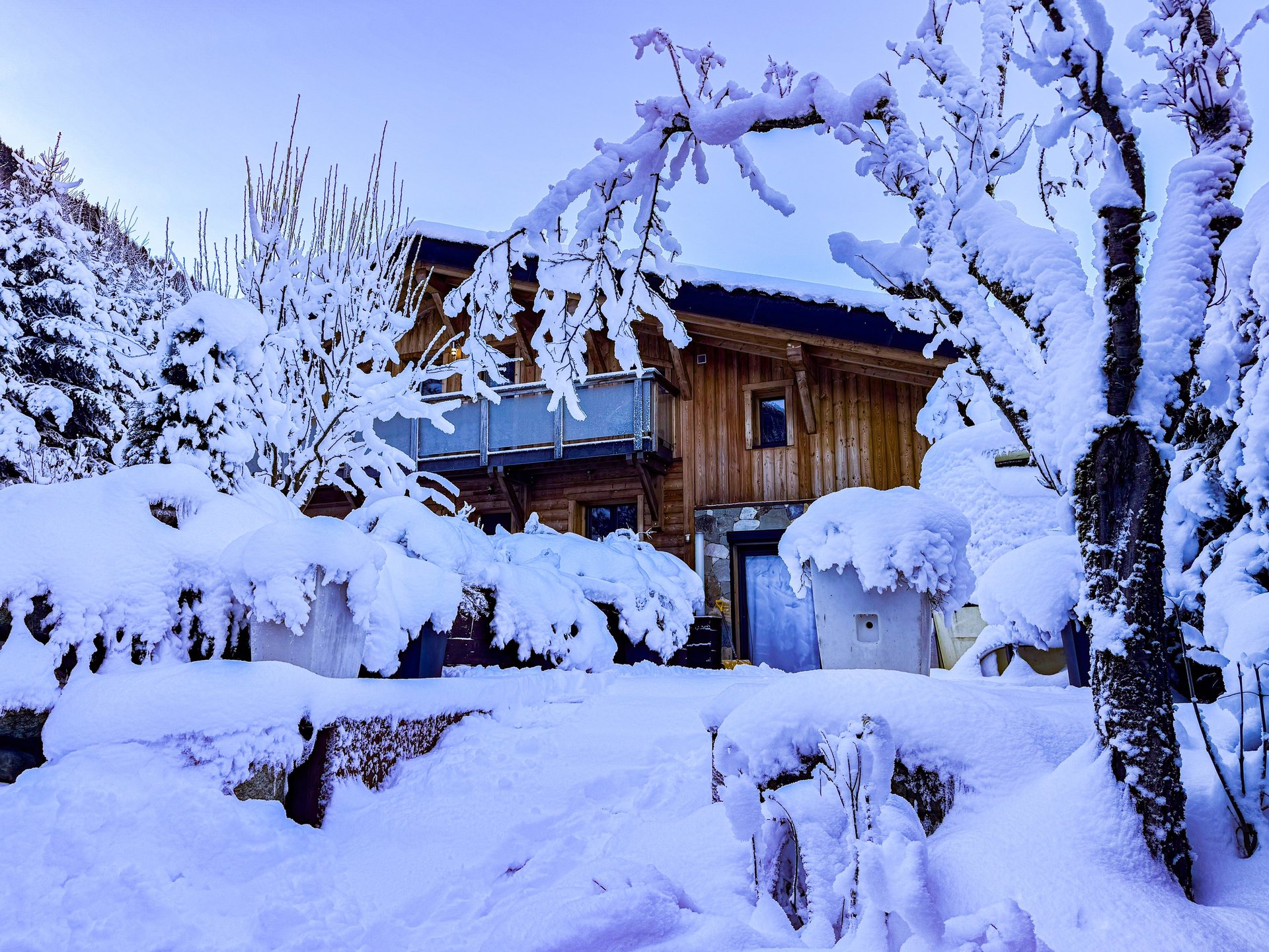 an abstract photo of a curved building with a blue sky in the background