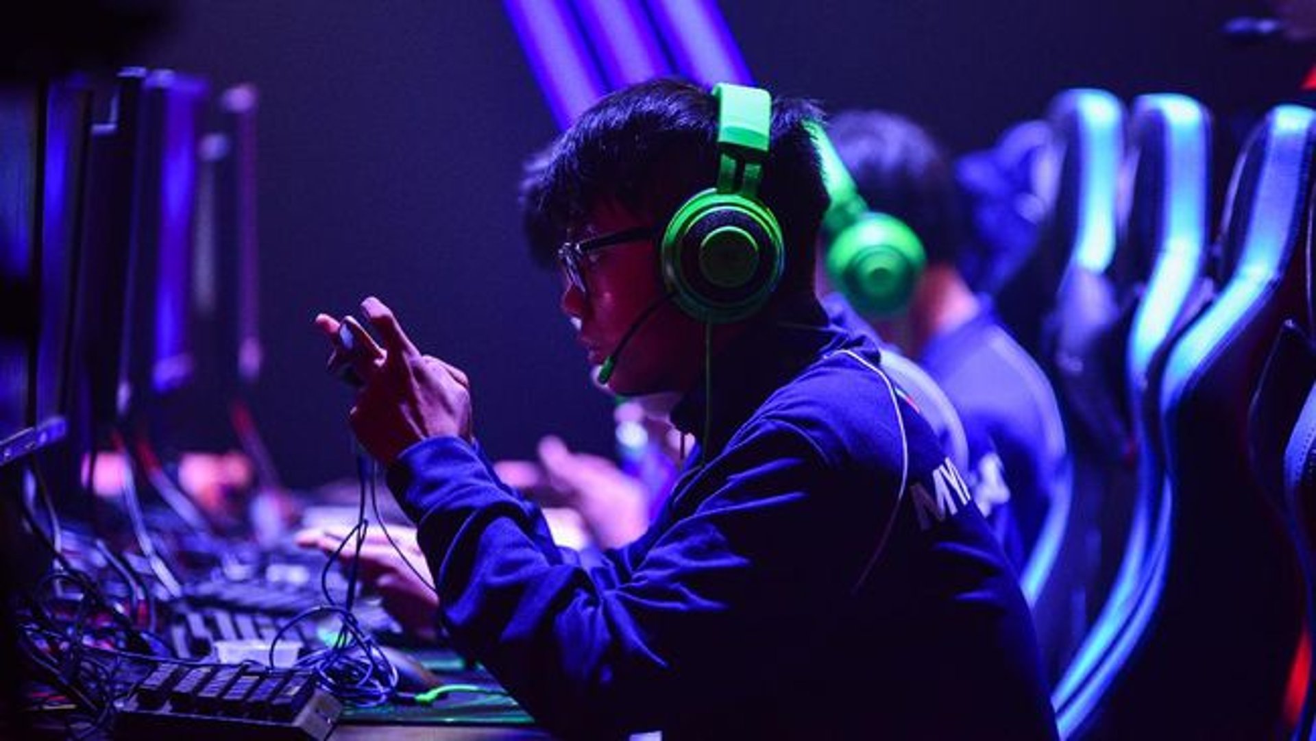 a person playing a video game on a laptop