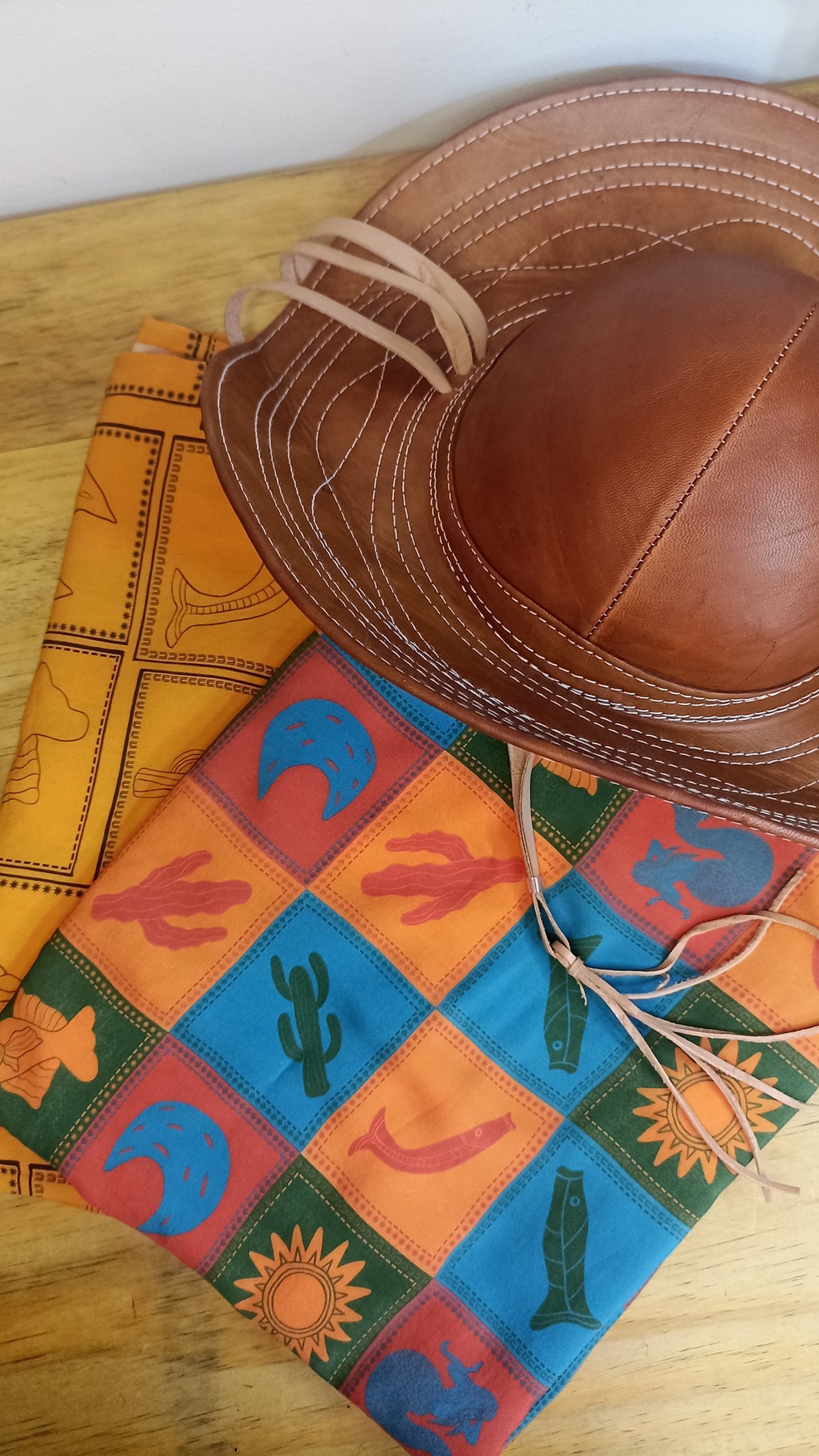 woman wearing yellow long-sleeved dress under white clouds and blue sky during daytime