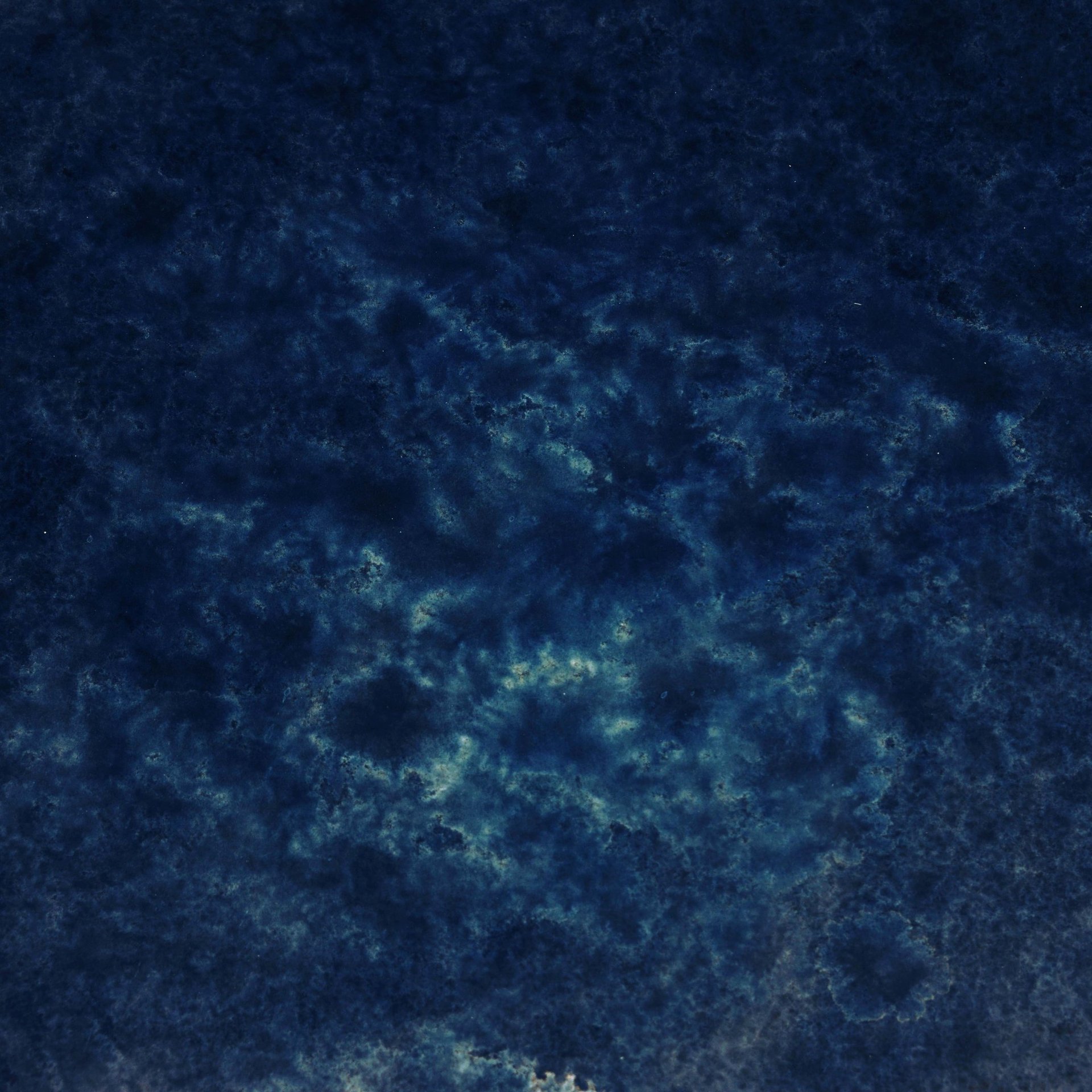 body of water under sky