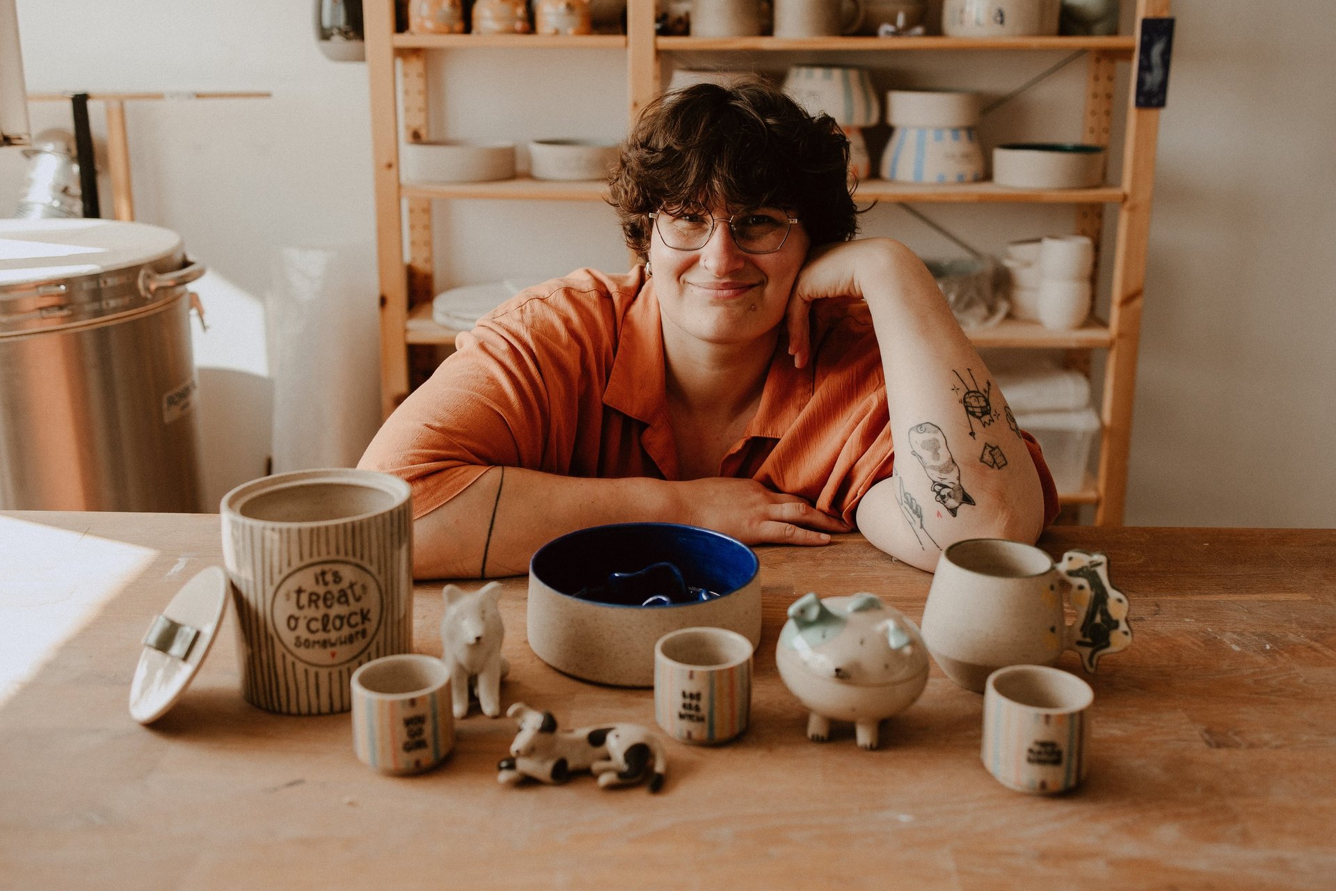 an abstract photo of a curved building with a blue sky in the background