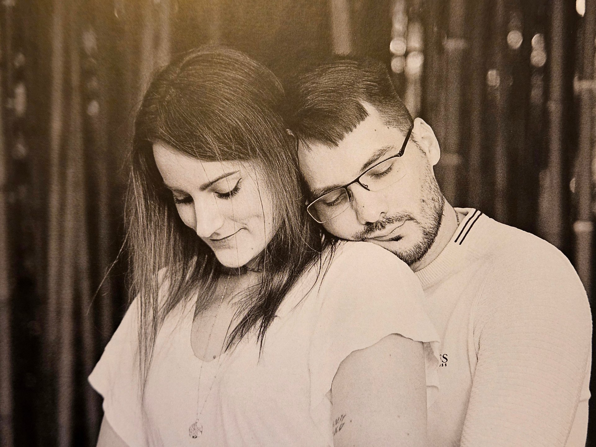 couple wearing silver-colored rings