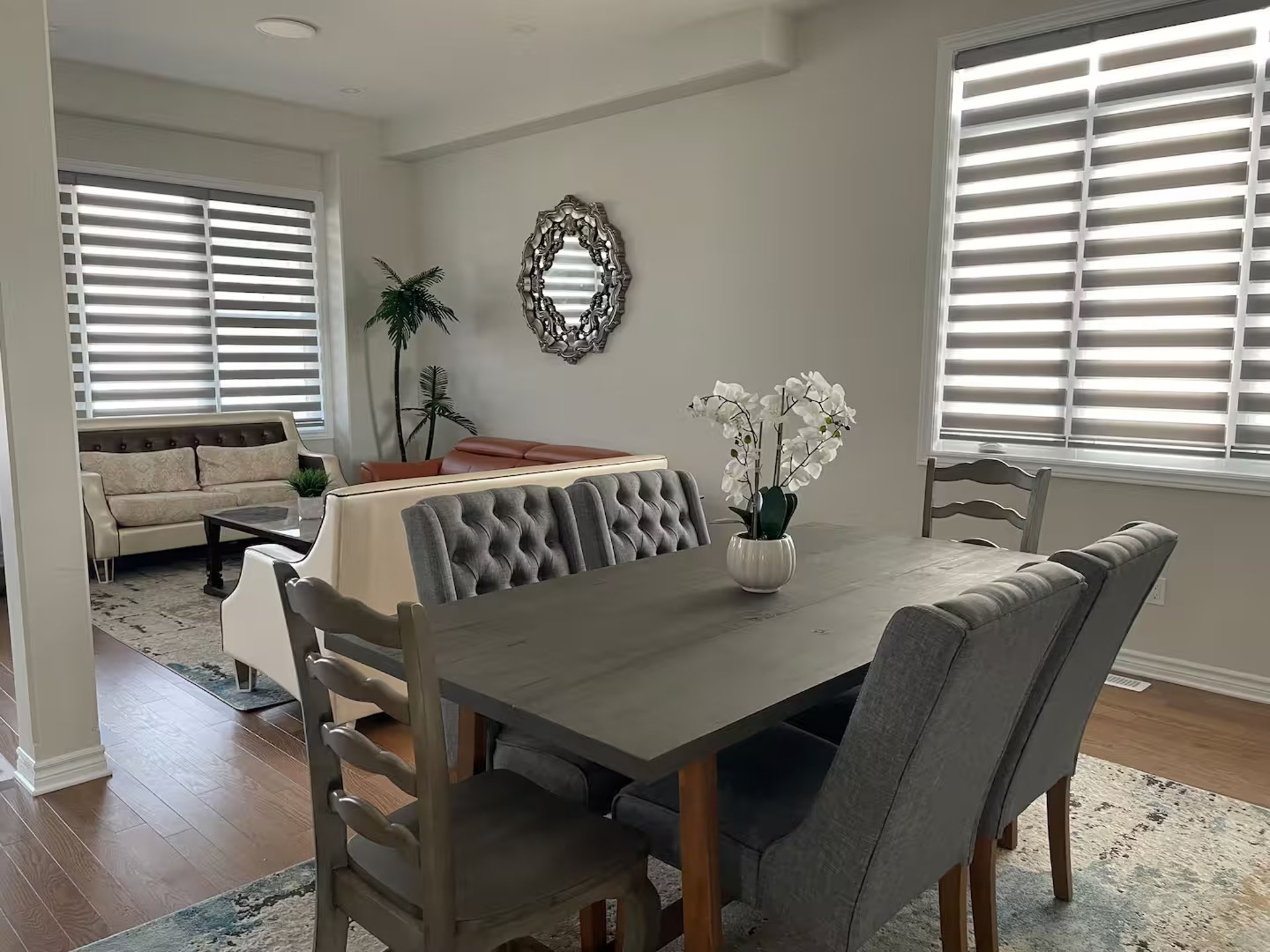 black and brown leather padded tub sofa