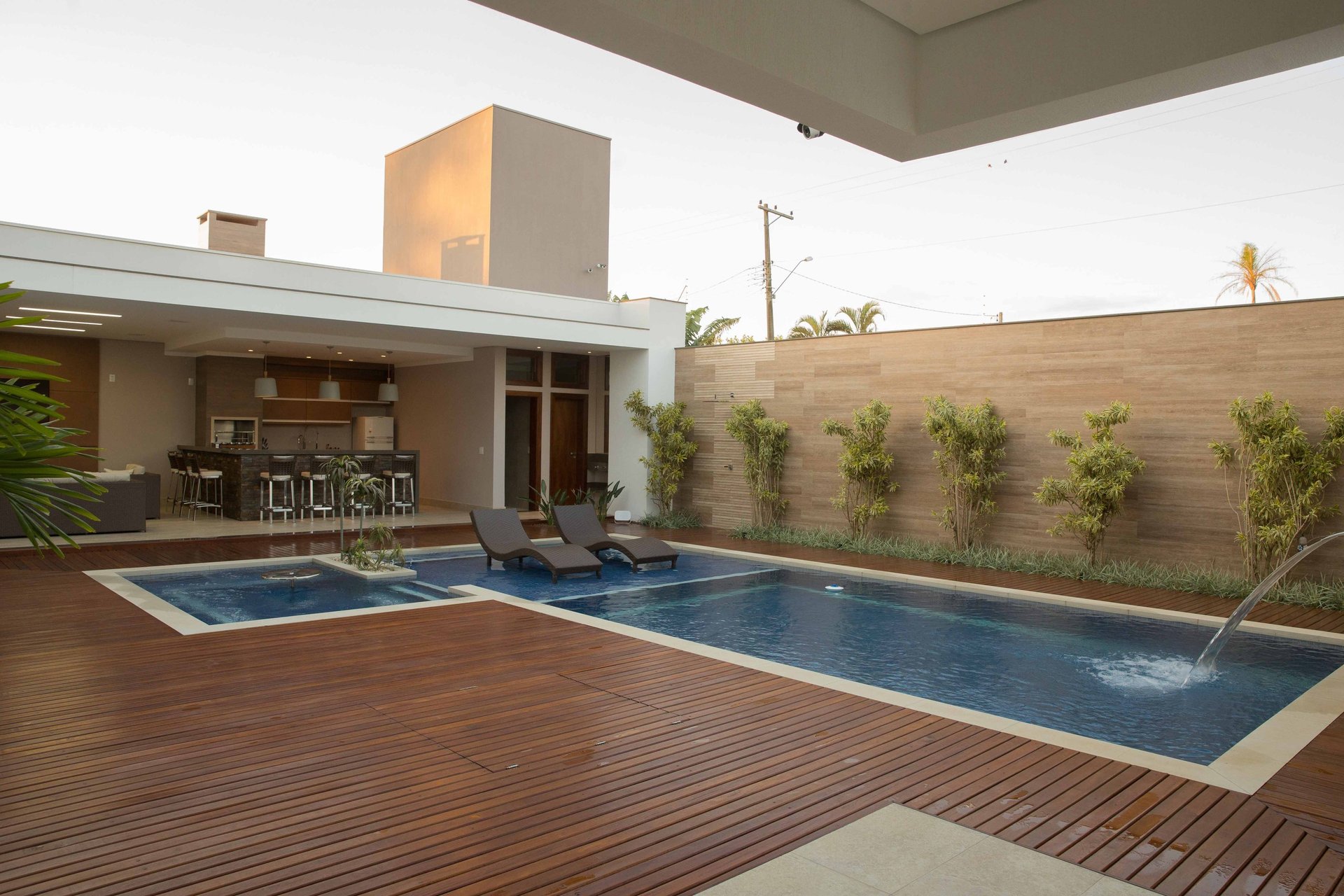 woman wearing yellow long-sleeved dress under white clouds and blue sky during daytime
