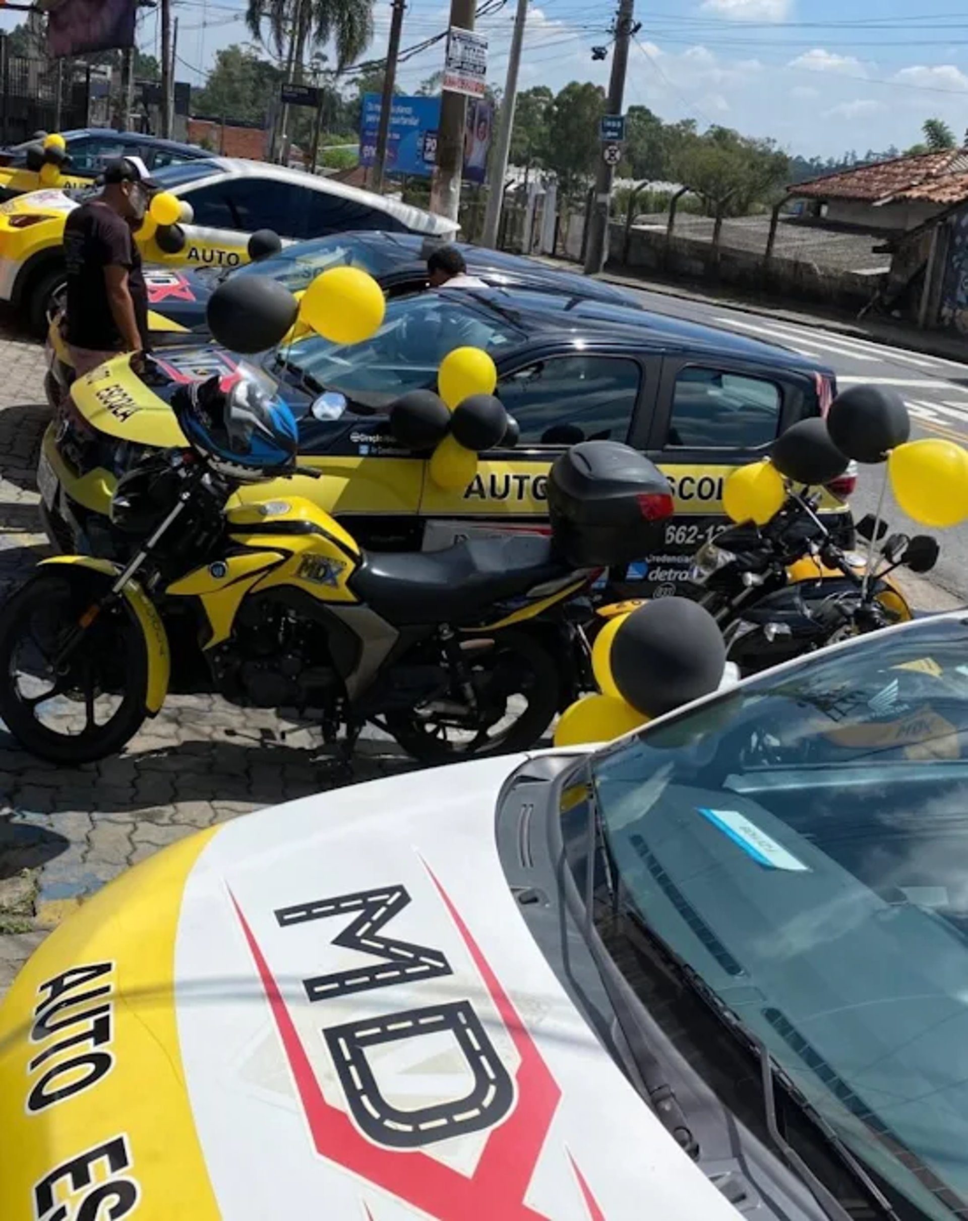 woman wearing yellow long-sleeved dress under white clouds and blue sky during daytime