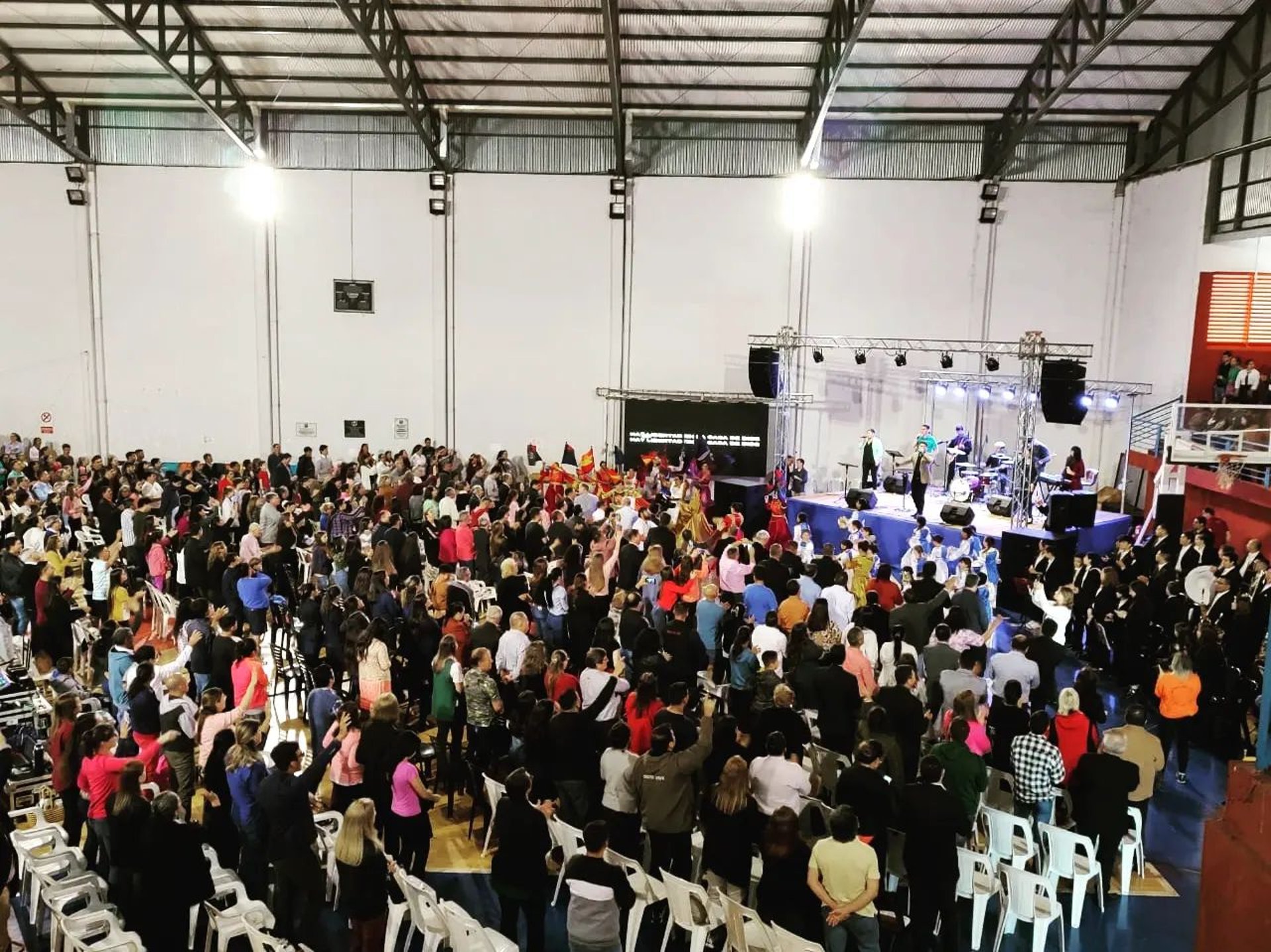 woman wearing yellow long-sleeved dress under white clouds and blue sky during daytime
