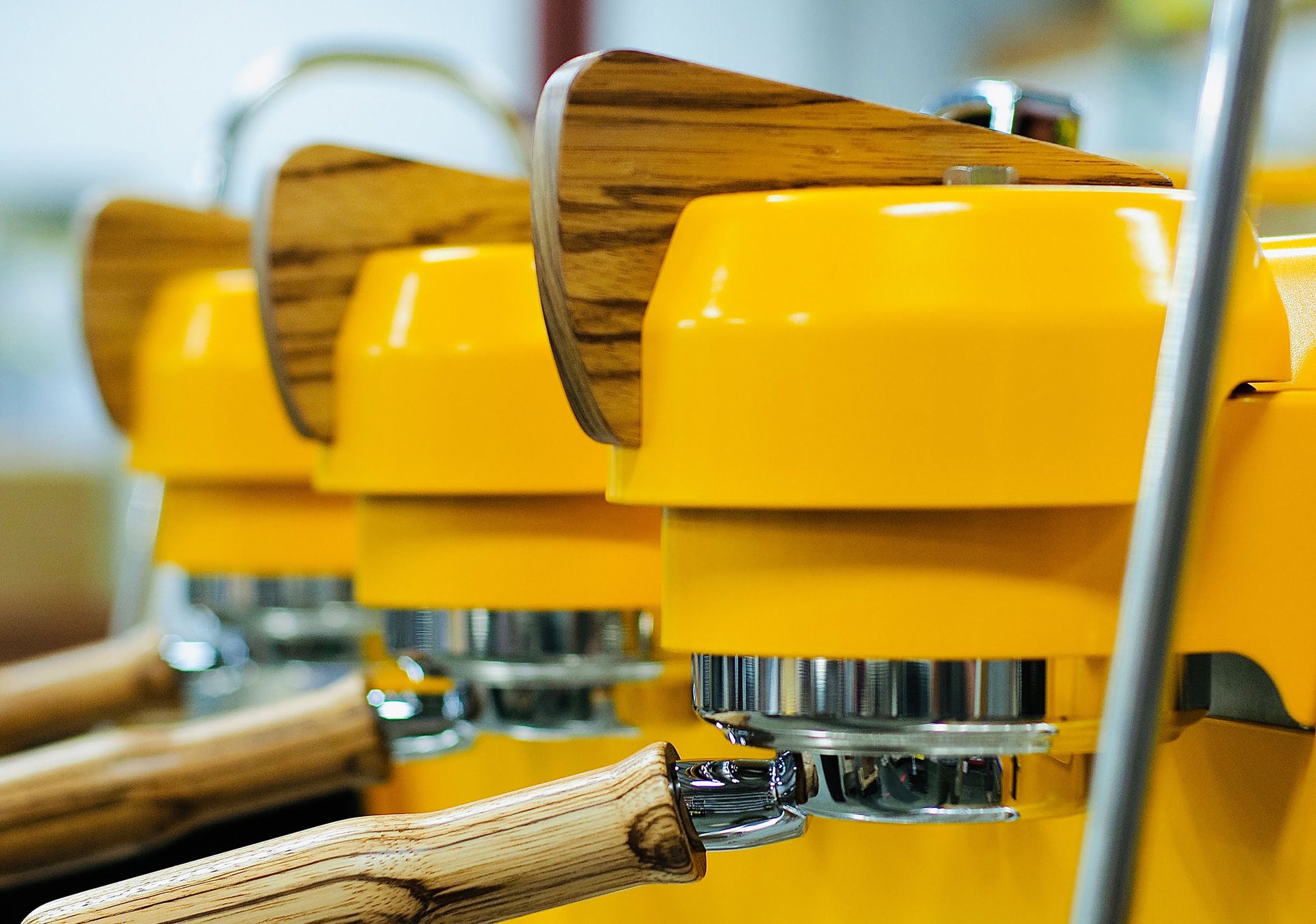woman wearing yellow long-sleeved dress under white clouds and blue sky during daytime