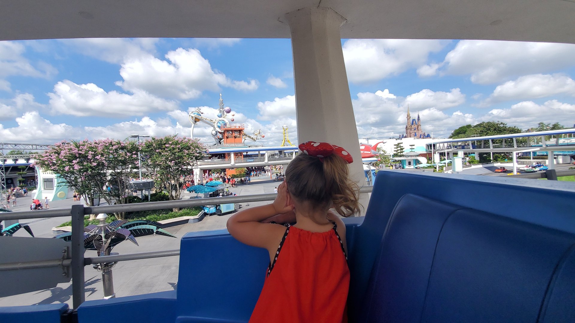 an abstract photo of a curved building with a blue sky in the background