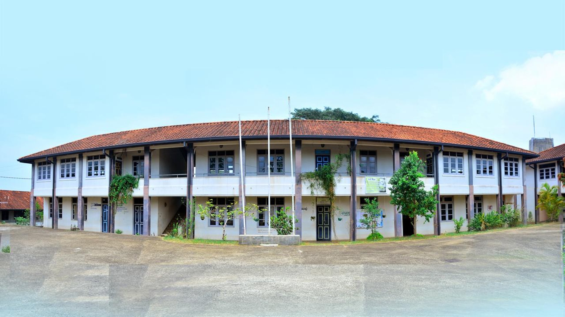 person wearing grey dress shirt beside table