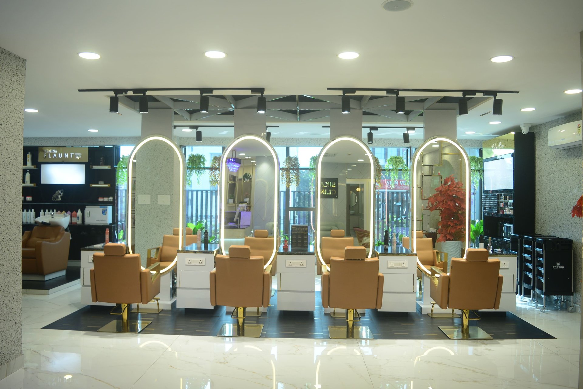 woman in gray sweater sitting on brown wooden chair