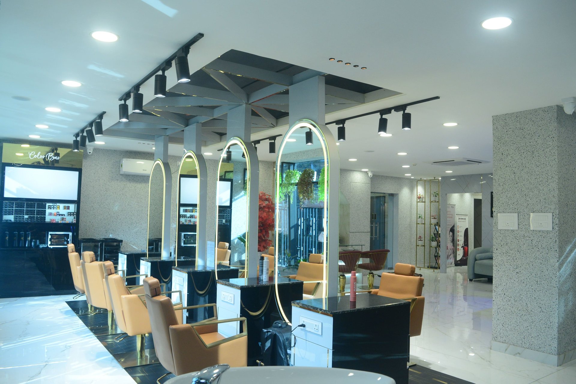 a woman getting her hair cut by a hair stylist