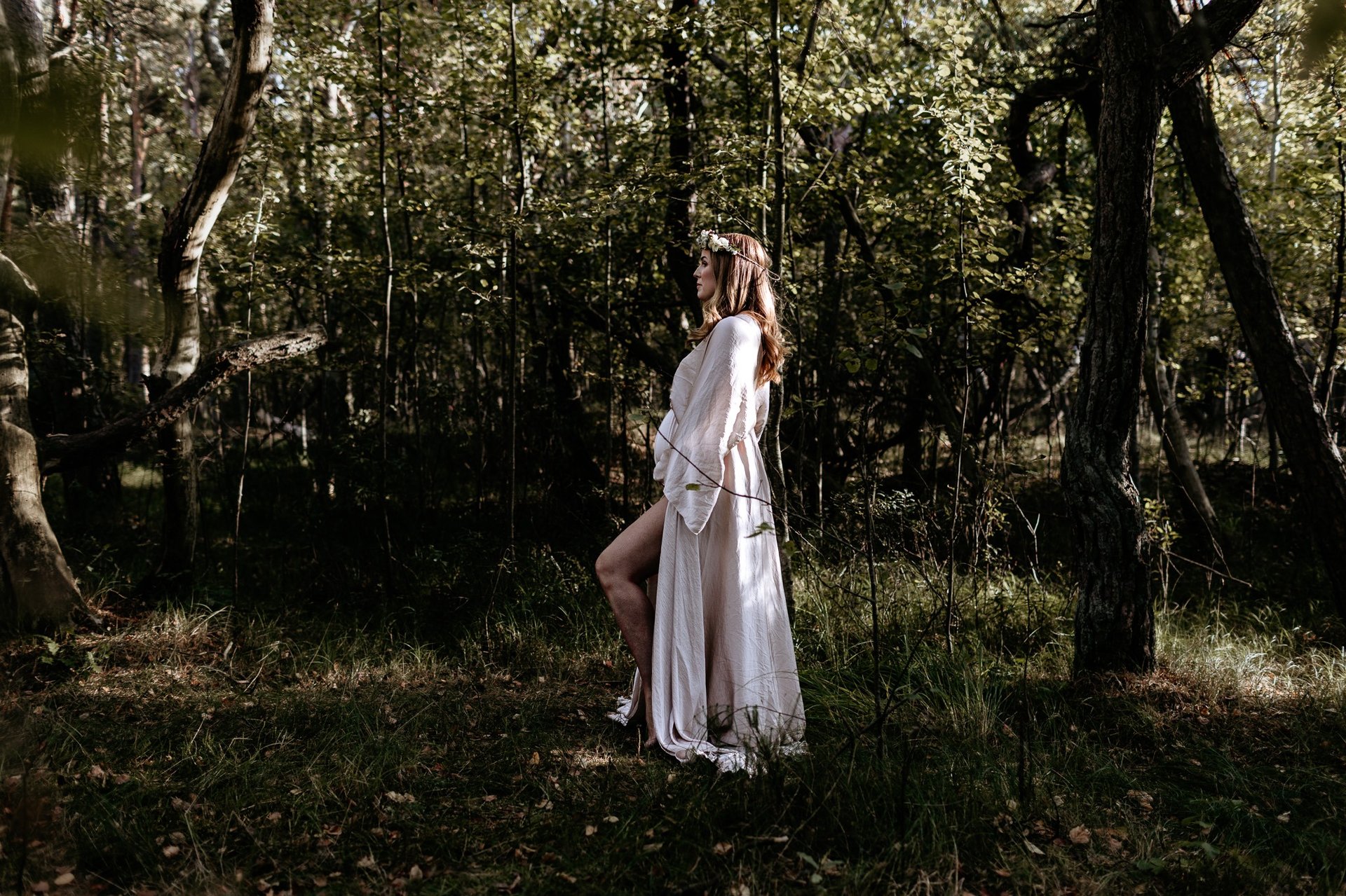 an abstract photo of a curved building with a blue sky in the background