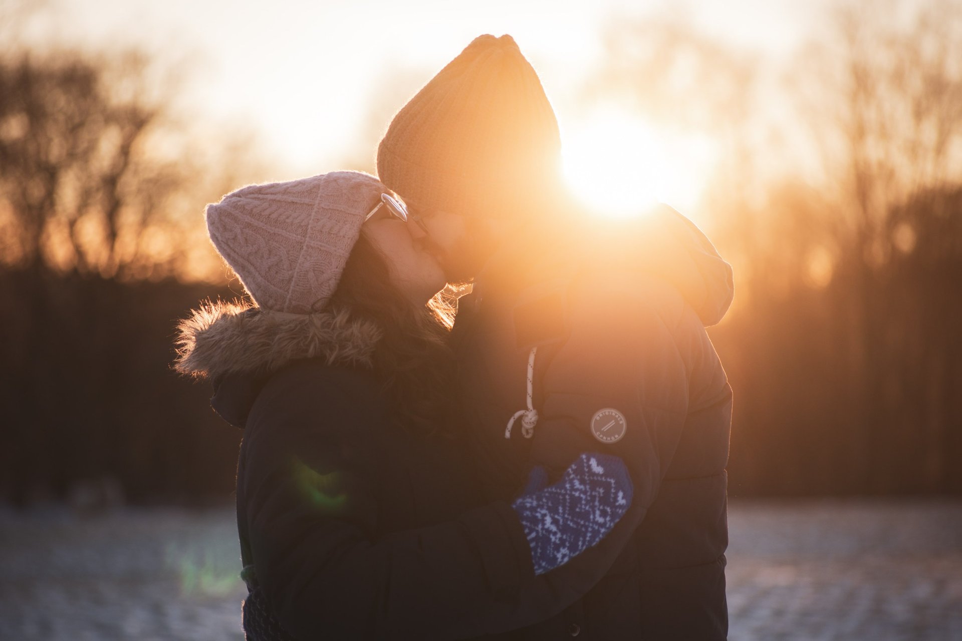 an abstract photo of a curved building with a blue sky in the background