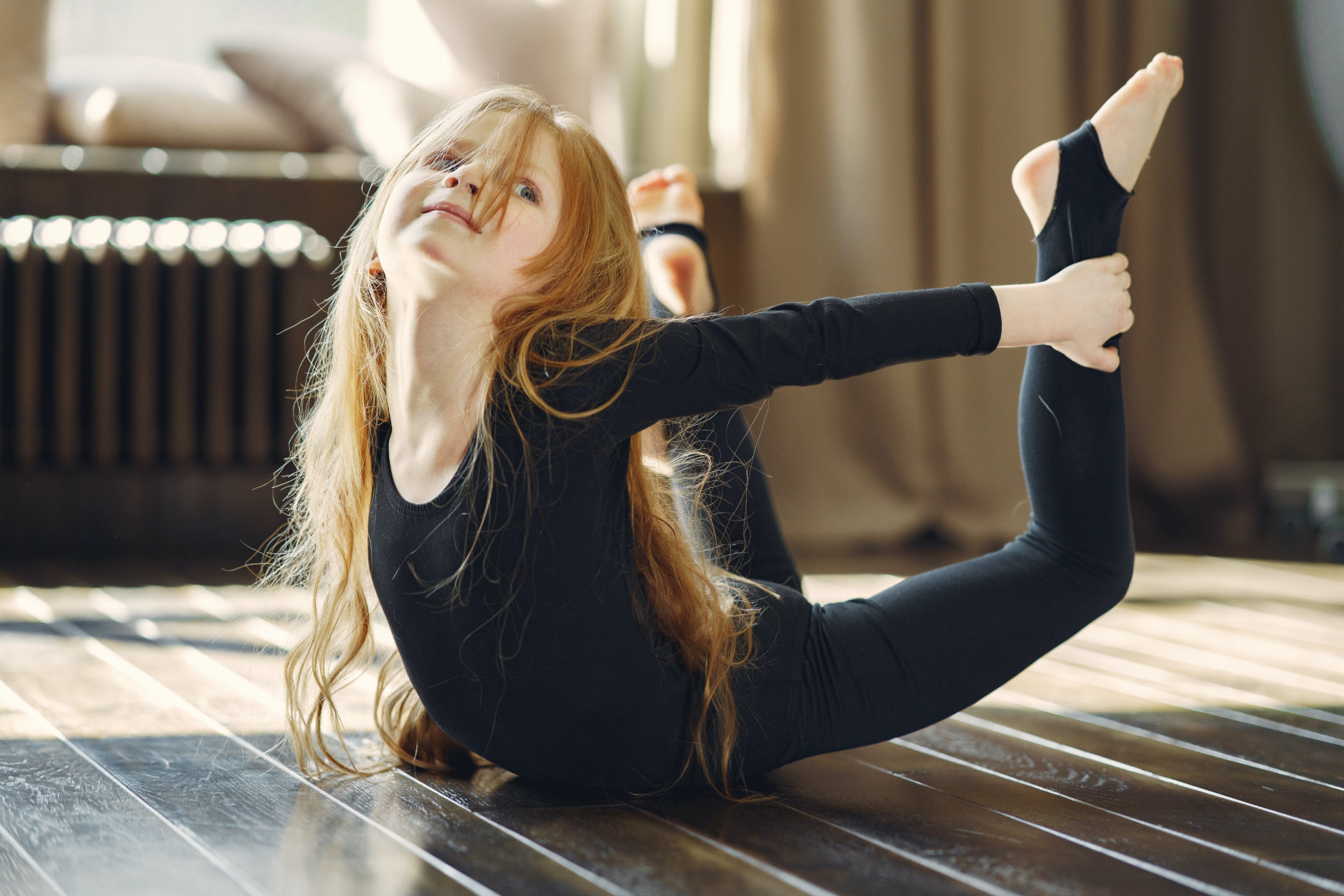 an abstract photo of a curved building with a blue sky in the background