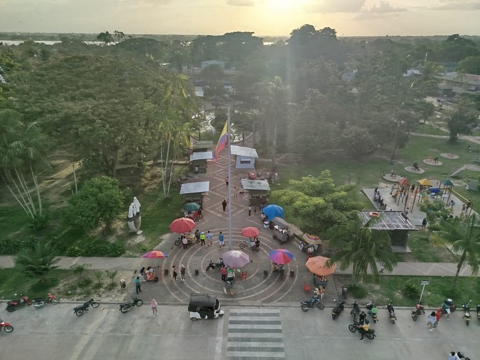 an abstract photo of a curved building with a blue sky in the background
