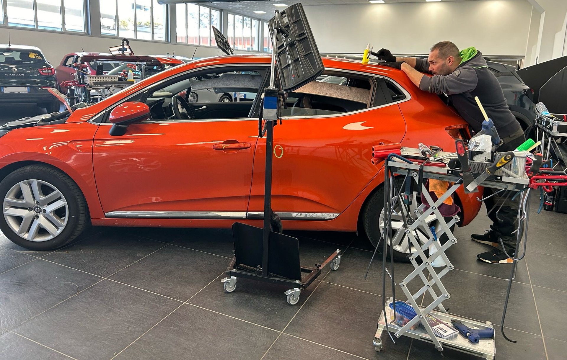 black and brown leather padded tub sofa