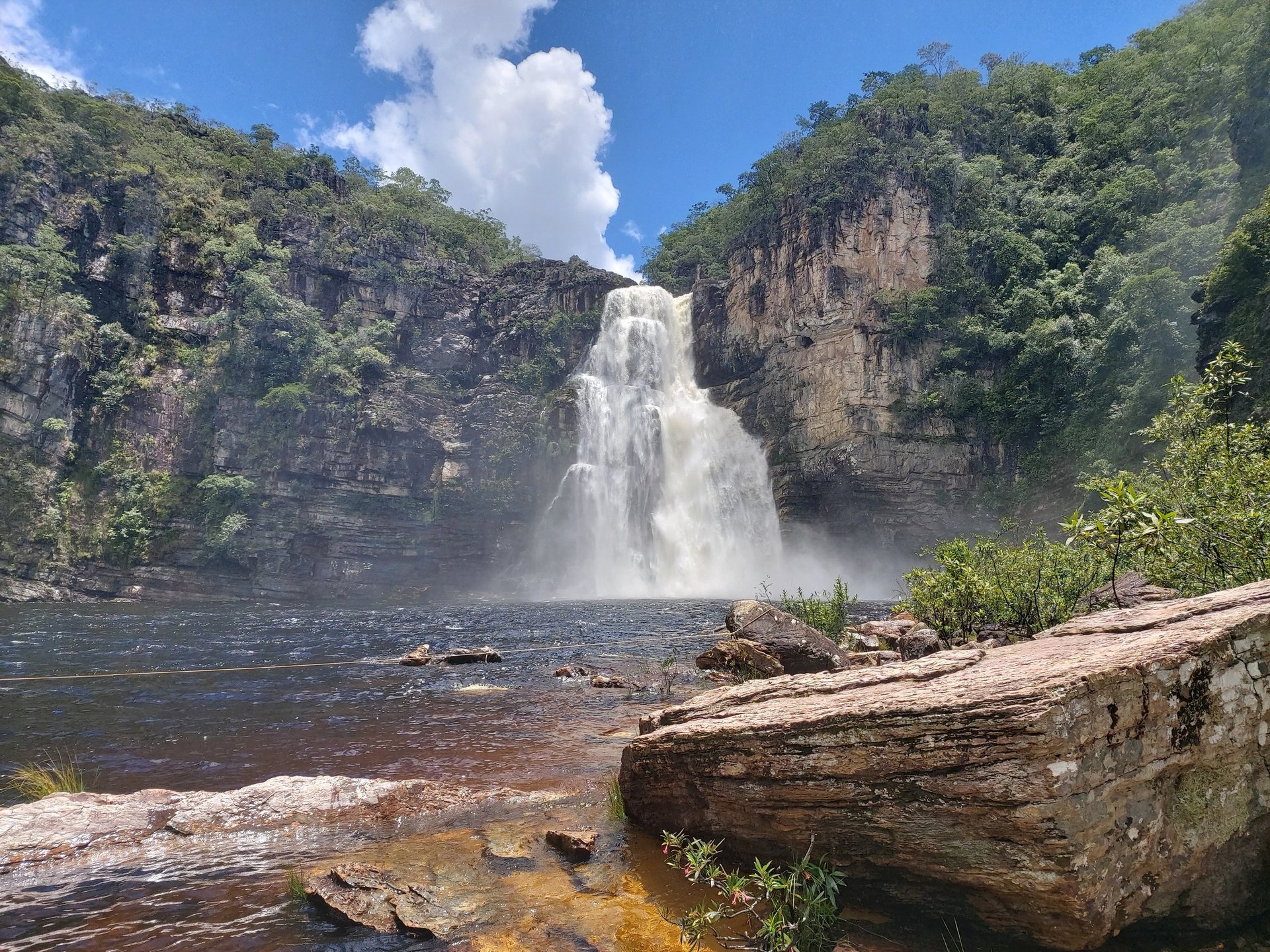 an abstract photo of a curved building with a blue sky in the background