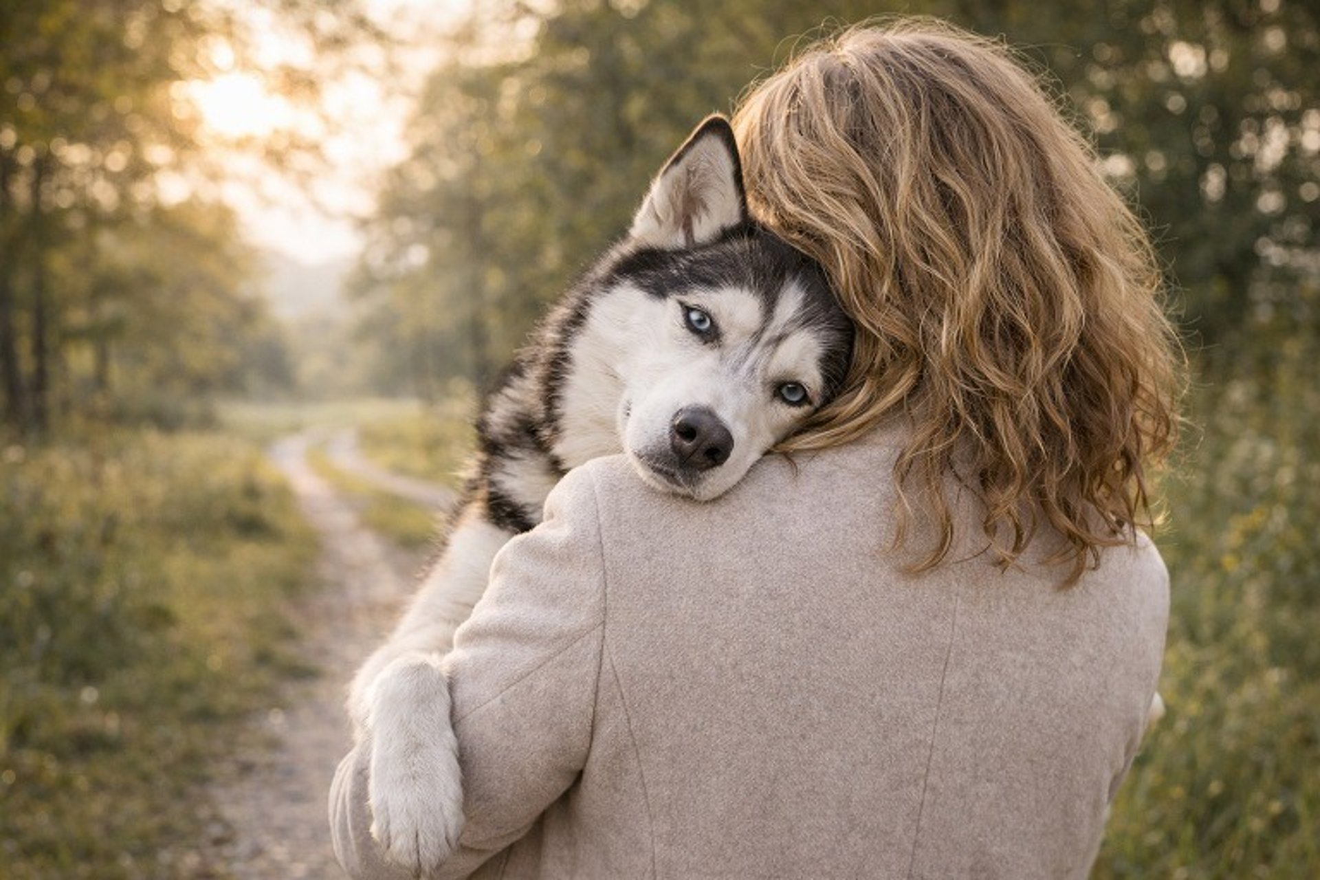 woman wearing yellow long-sleeved dress under white clouds and blue sky during daytime