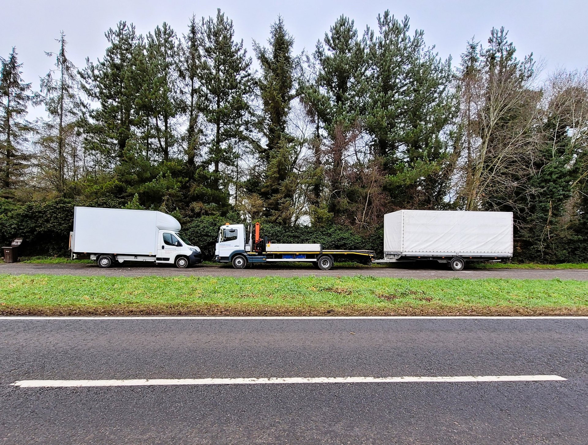 black and brown leather padded tub sofa
